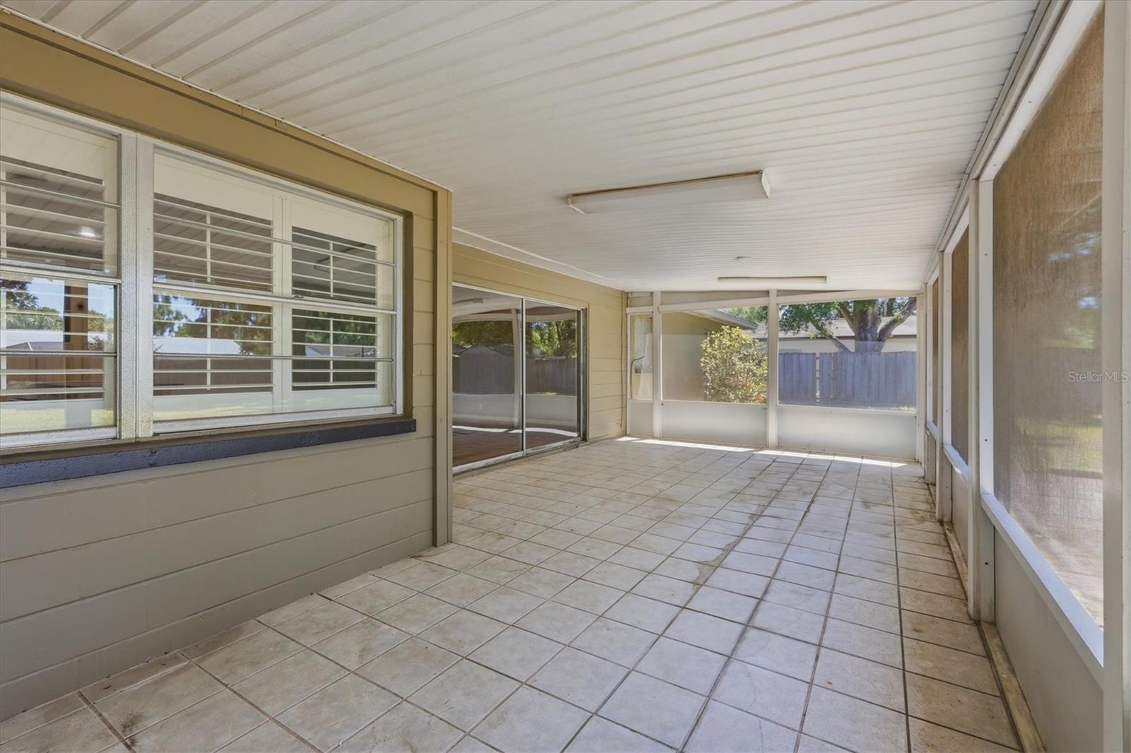 View to the back of the house and screened patio