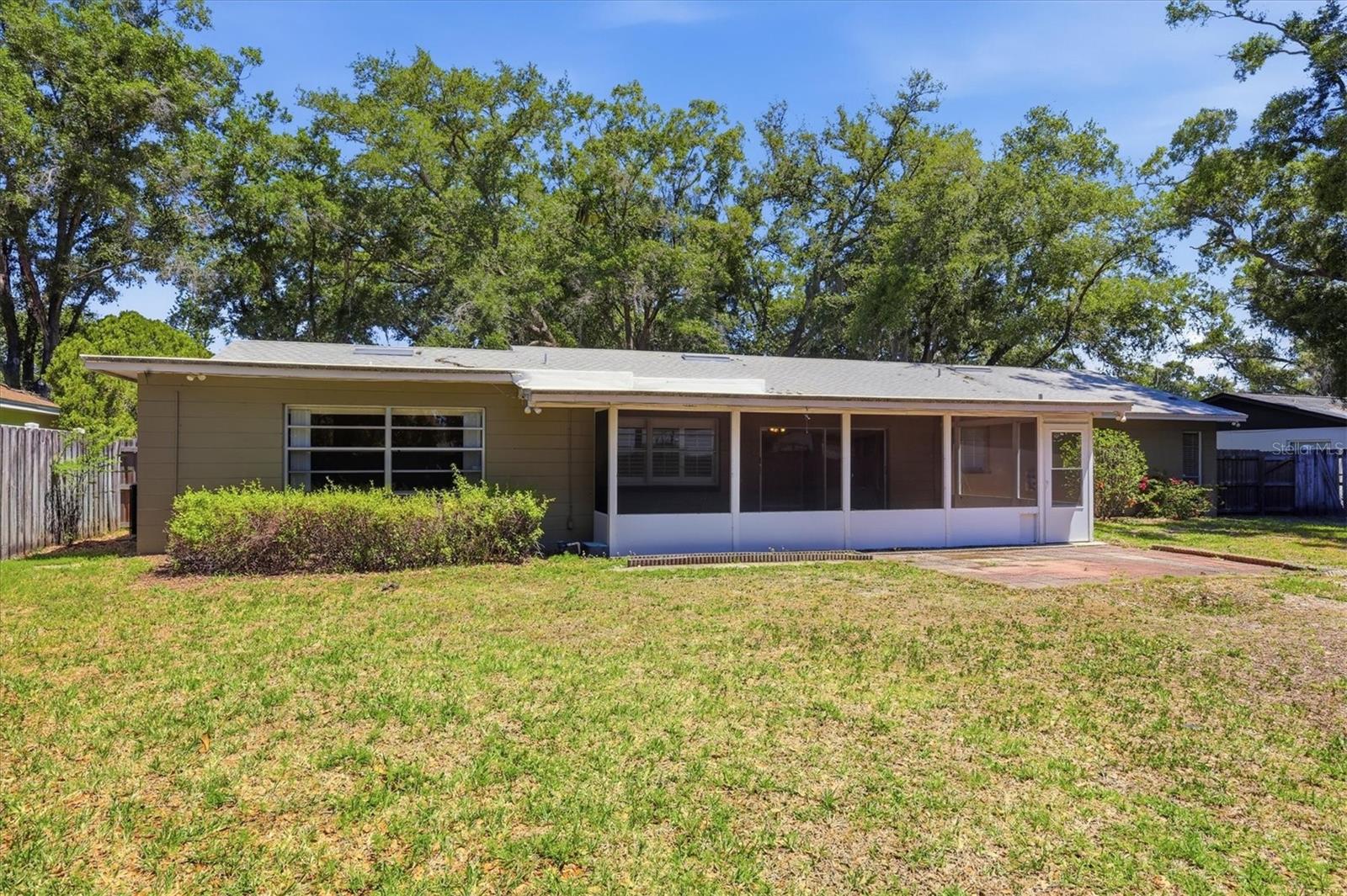 This back yard is a blank canvas waiting for you!  Bring your vision to life here!