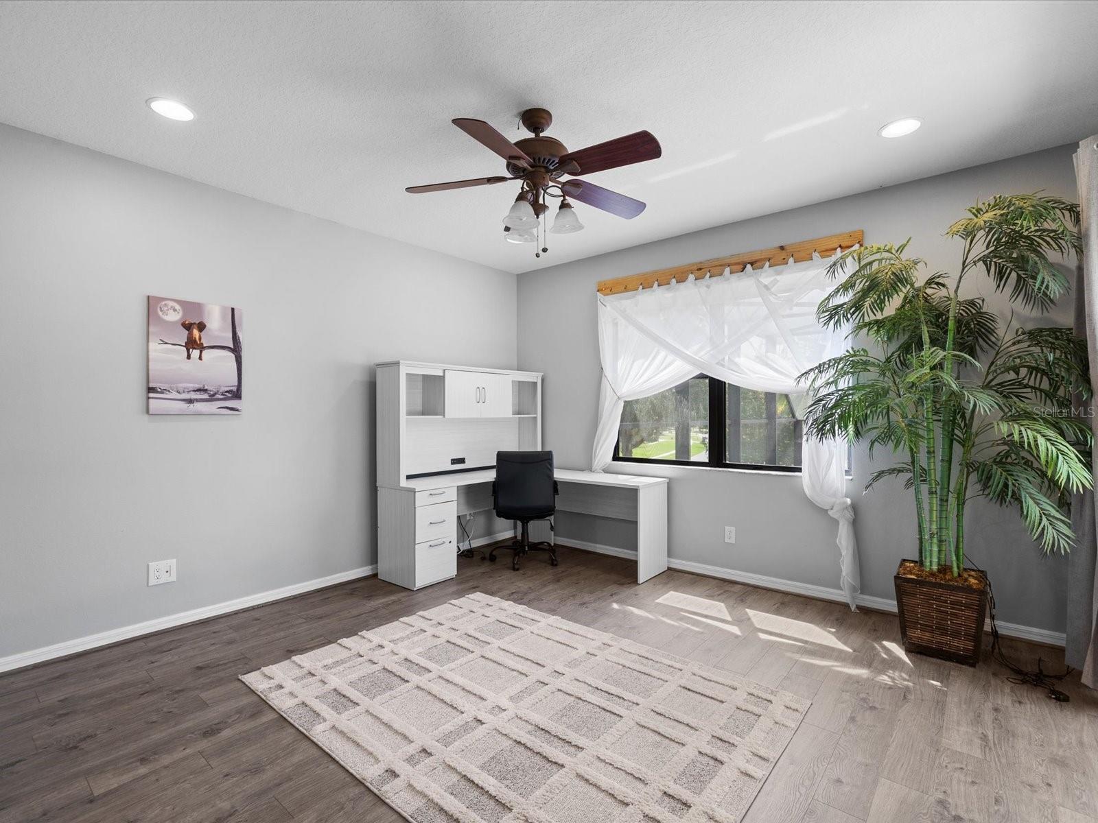 4th bedroom with sliders to balcony