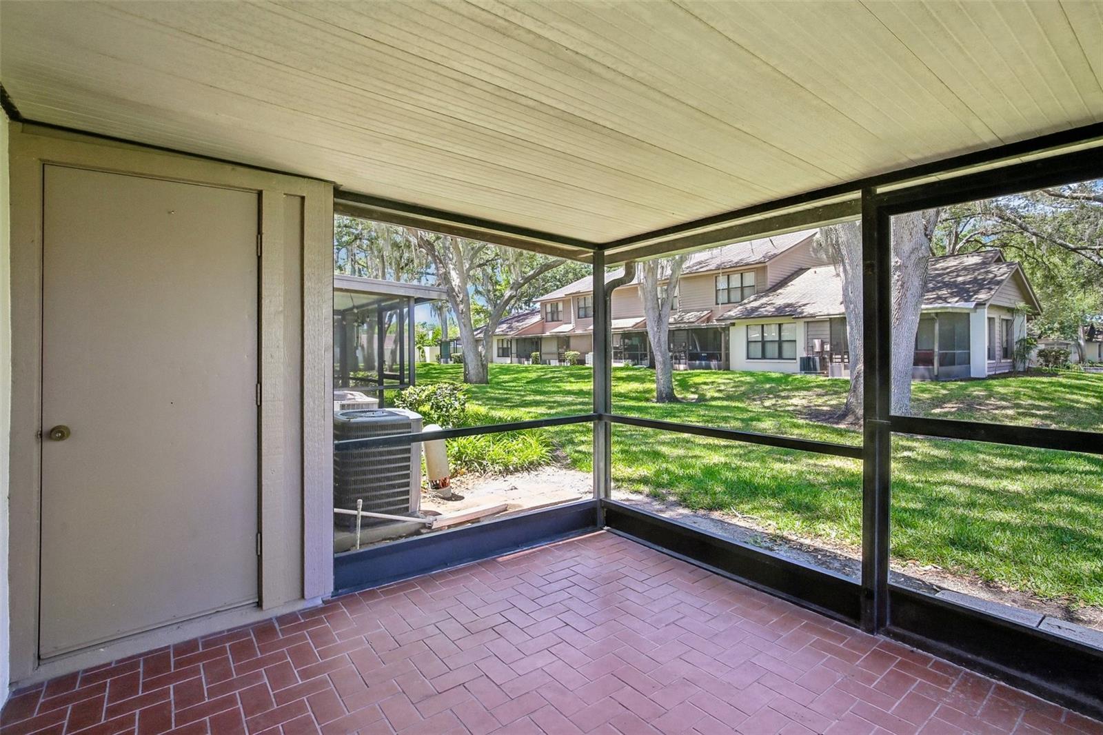 SCREENED BACK LANAI WITH STORAGE CLOSET