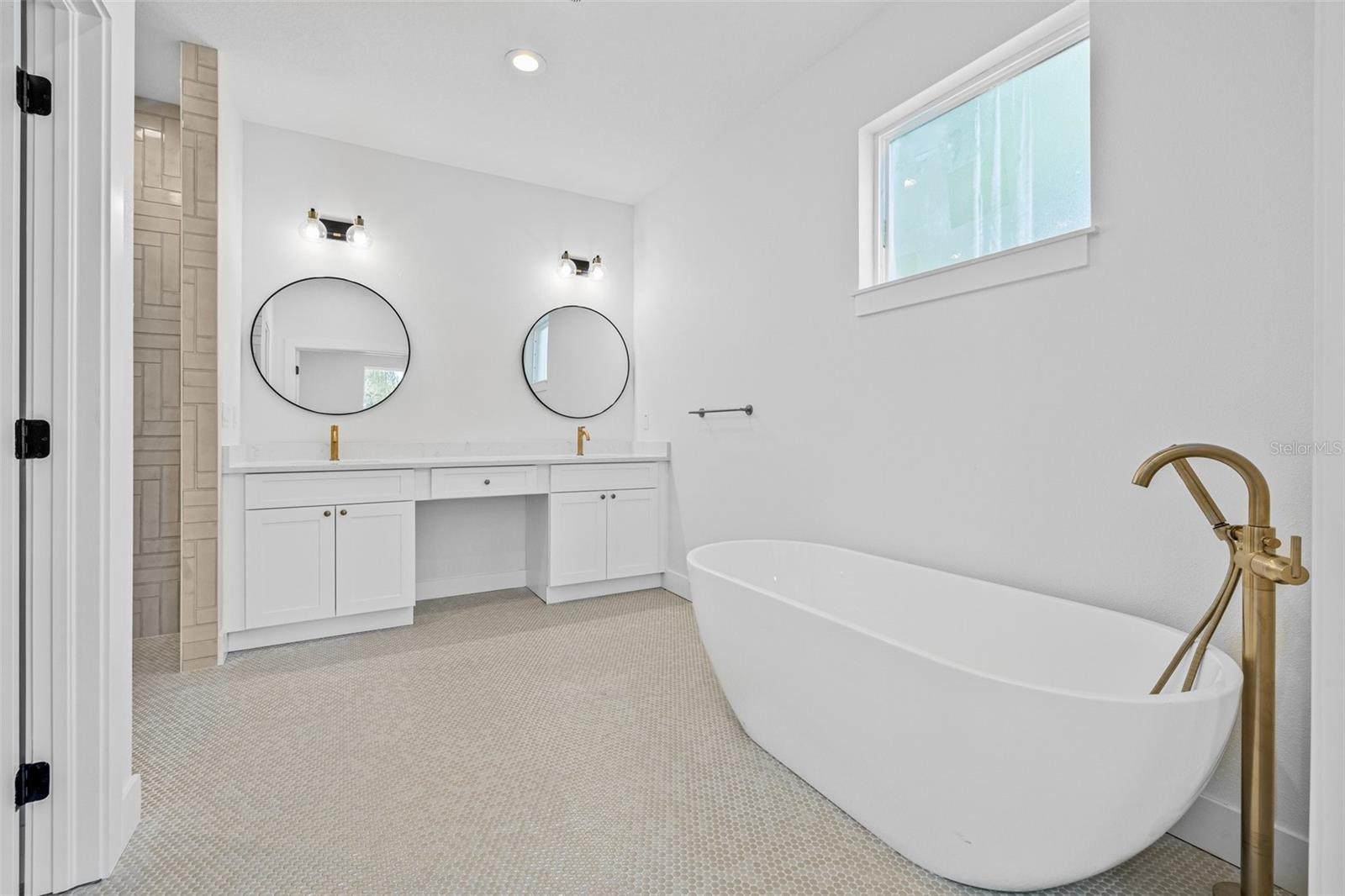 Primary bath and stand alone tub