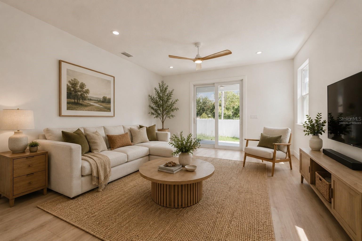 Living Room off of the kitchen  (Virtually Staged)
