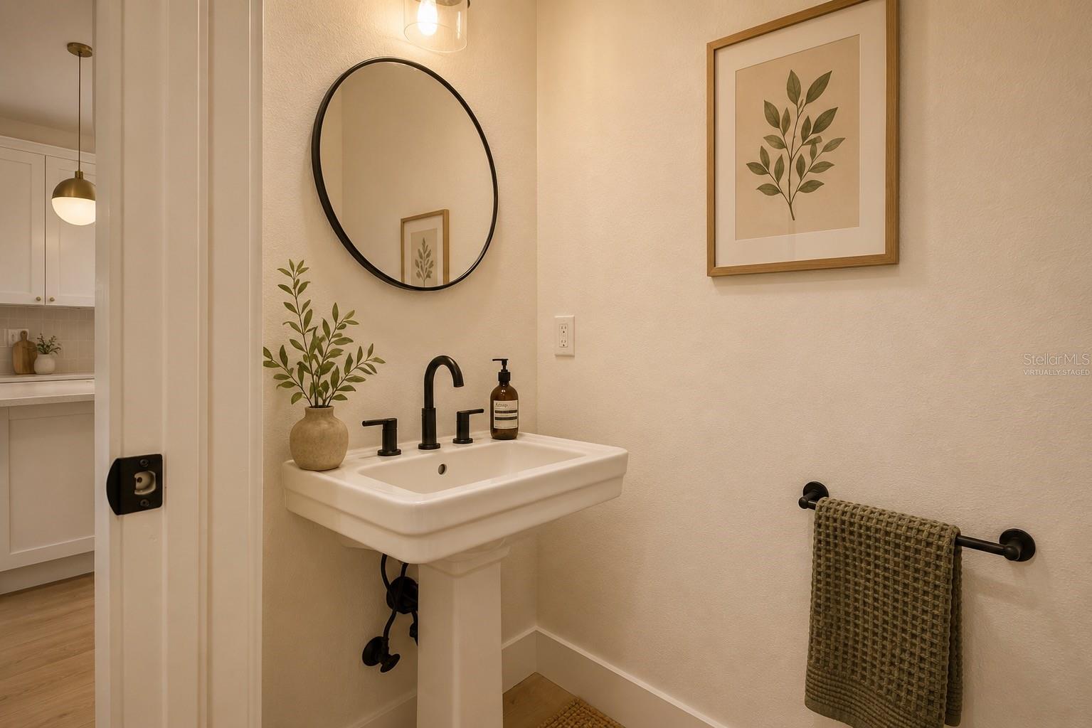 Half Bath Downstairs  (Virtually Staged)