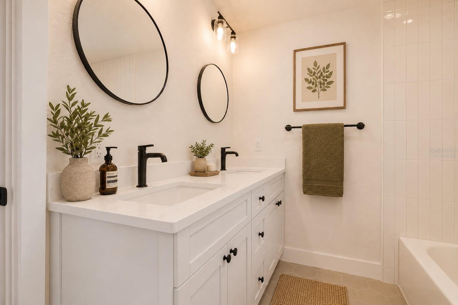 2nd Bathroom Upstairs with Tub and private  toliet room  (Virtually Staged)