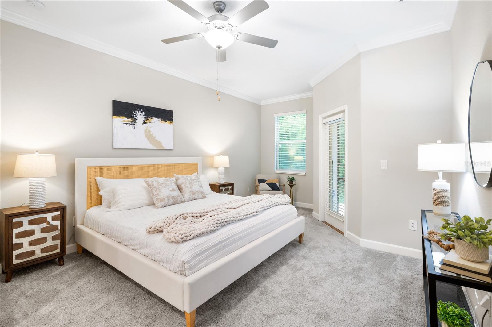 First Floor Primary Bedroom with access to lanai.