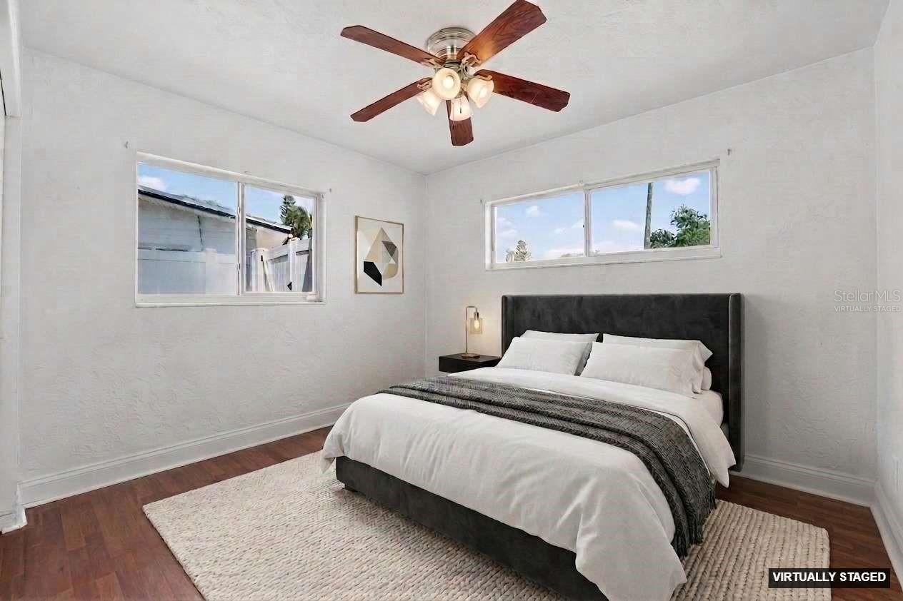 Virtually staged. Versatile bedroom space with natural light and closet storage