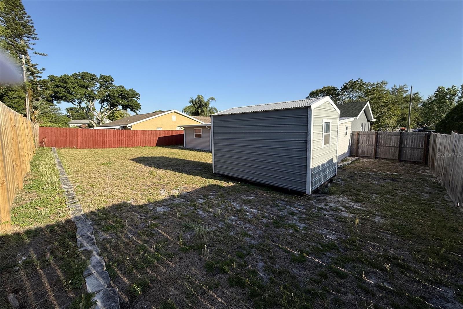 Backyard with Aluminum Shed