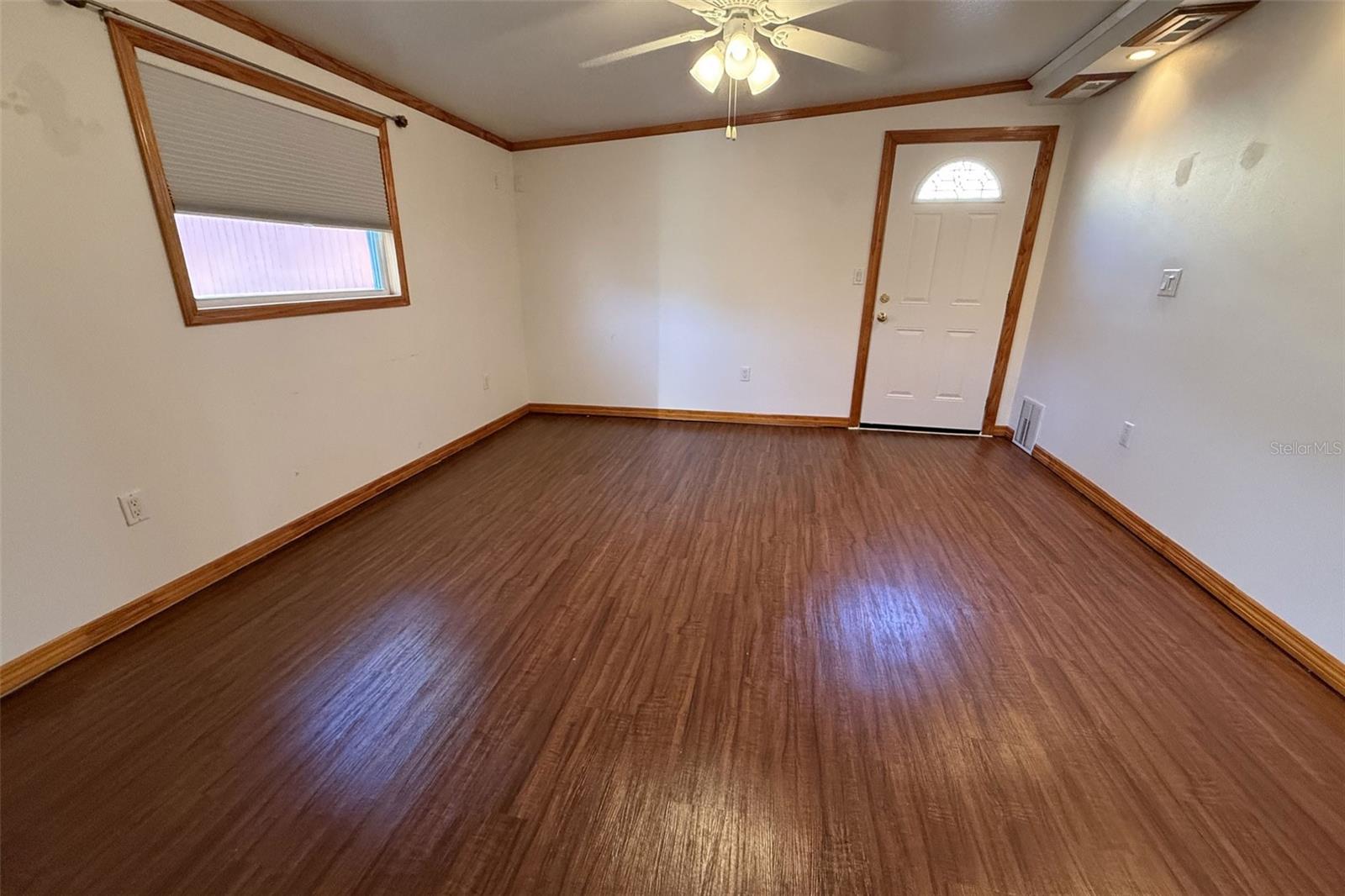 Bedroom 1 with vinyl flooring