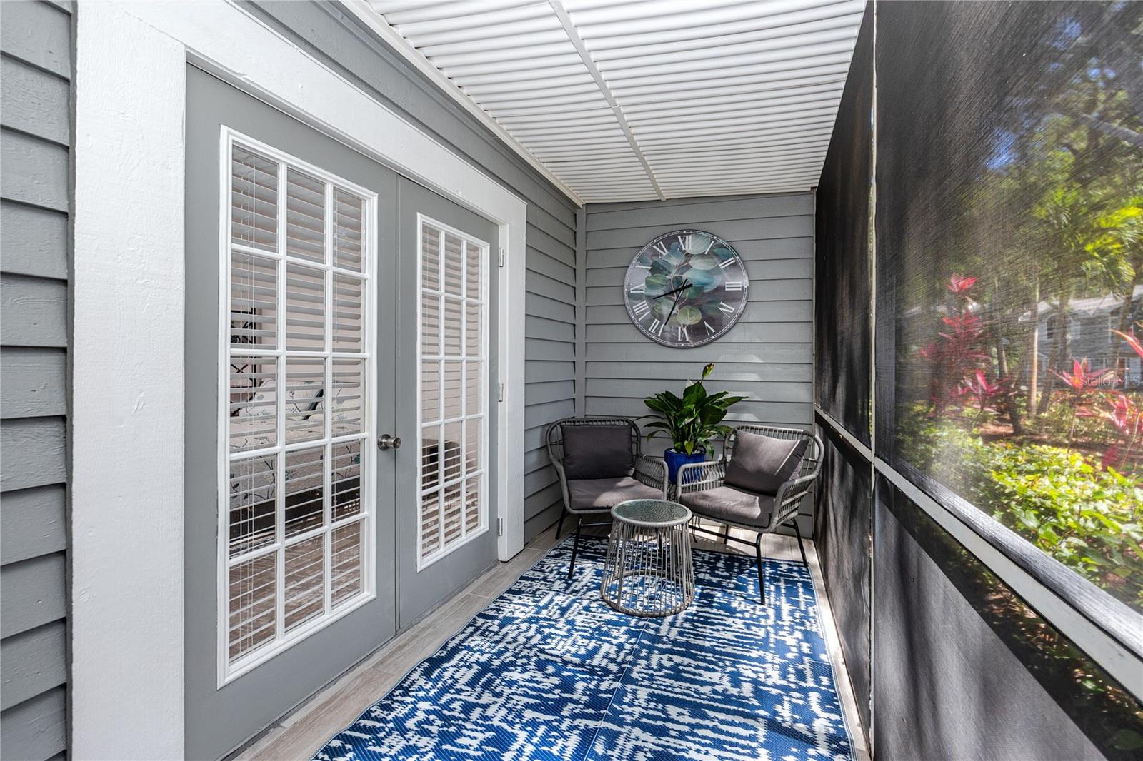Screened Enclosed Patio at 2101 Fox Chase Blvd, #107, Palm Harbor, FL 34683