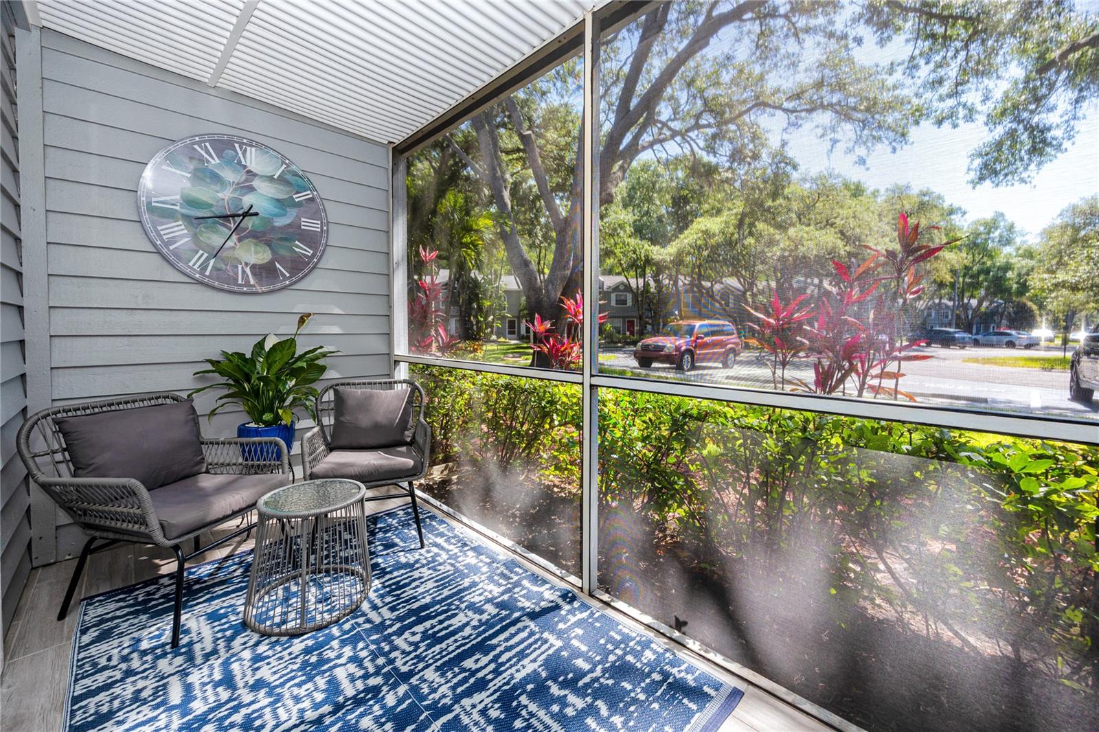Screened Enclosed Patio at 2101 Fox Chase Blvd, #107, Palm Harbor, FL 34683