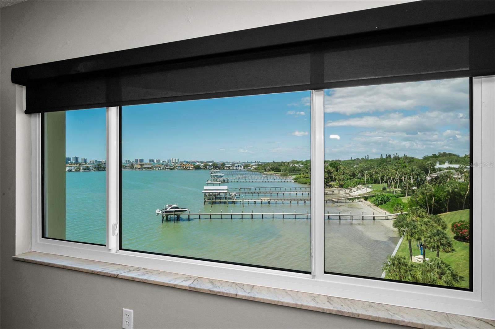 Storm windows with blinds