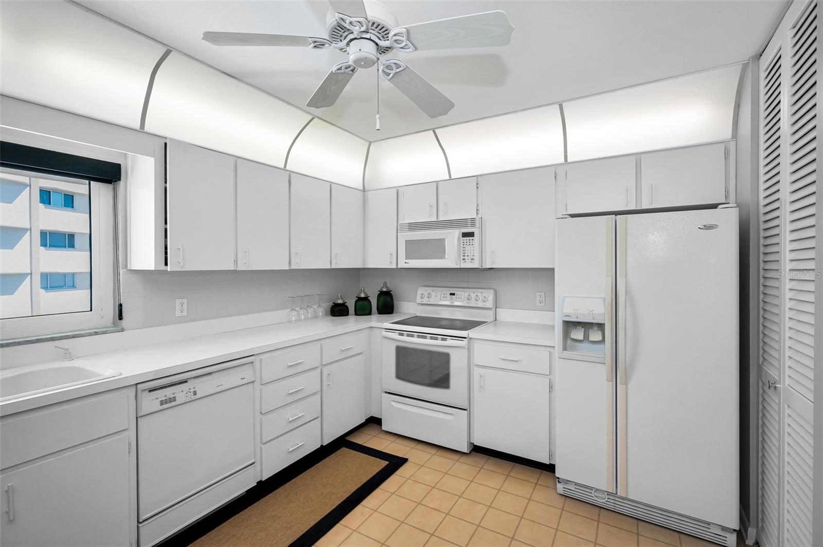 Clean and bright kitchen with pantry
