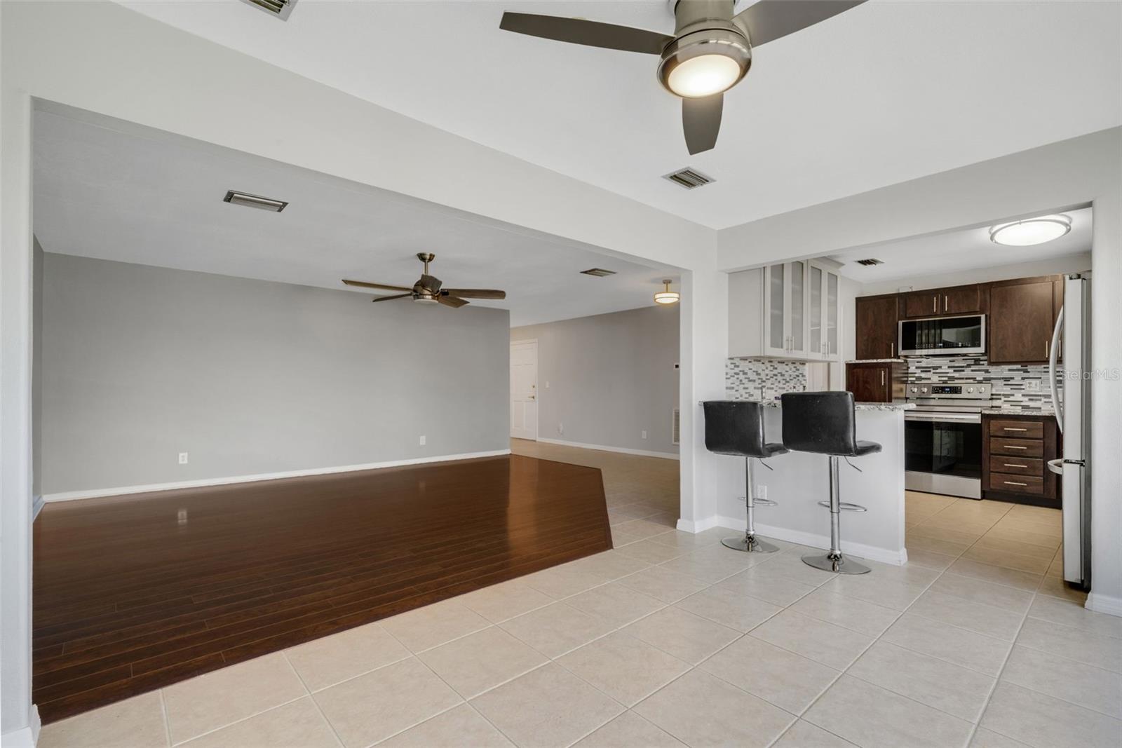 Florida Room Looking to Breakfast Bar, Kitchen and Living Room