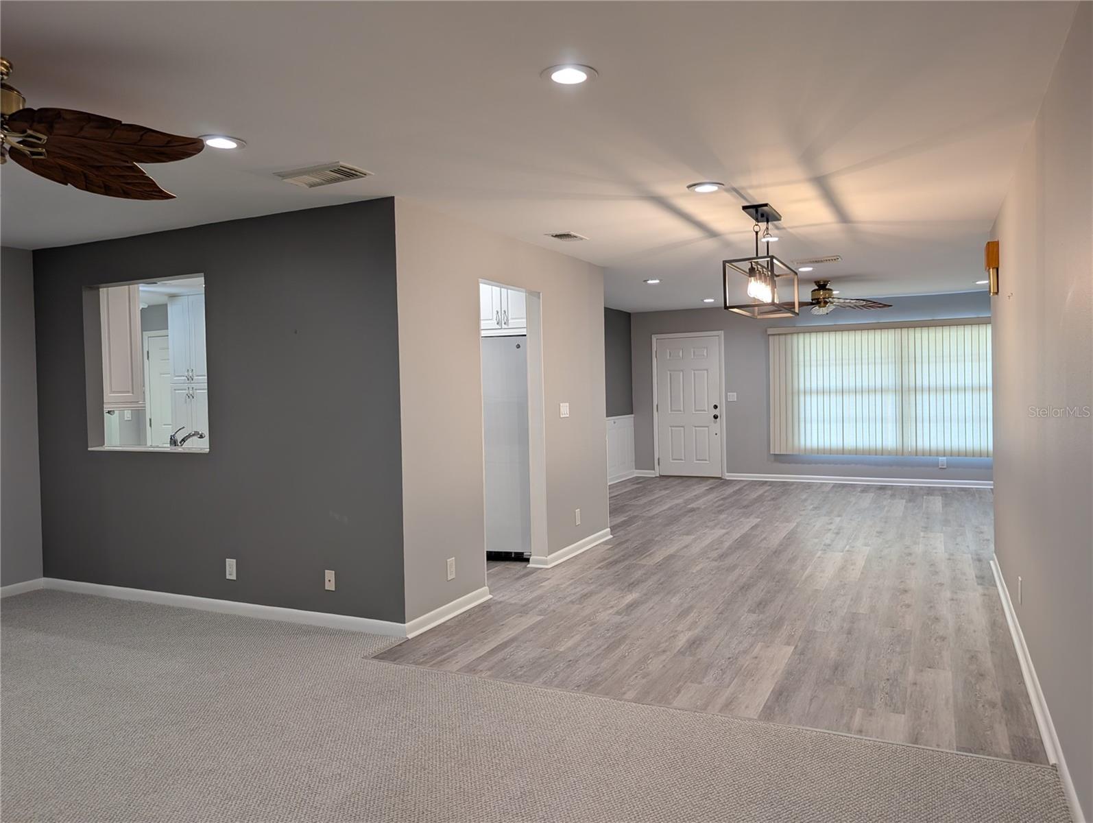 View of Florida room, dining room, living room and kitchen floor plan.