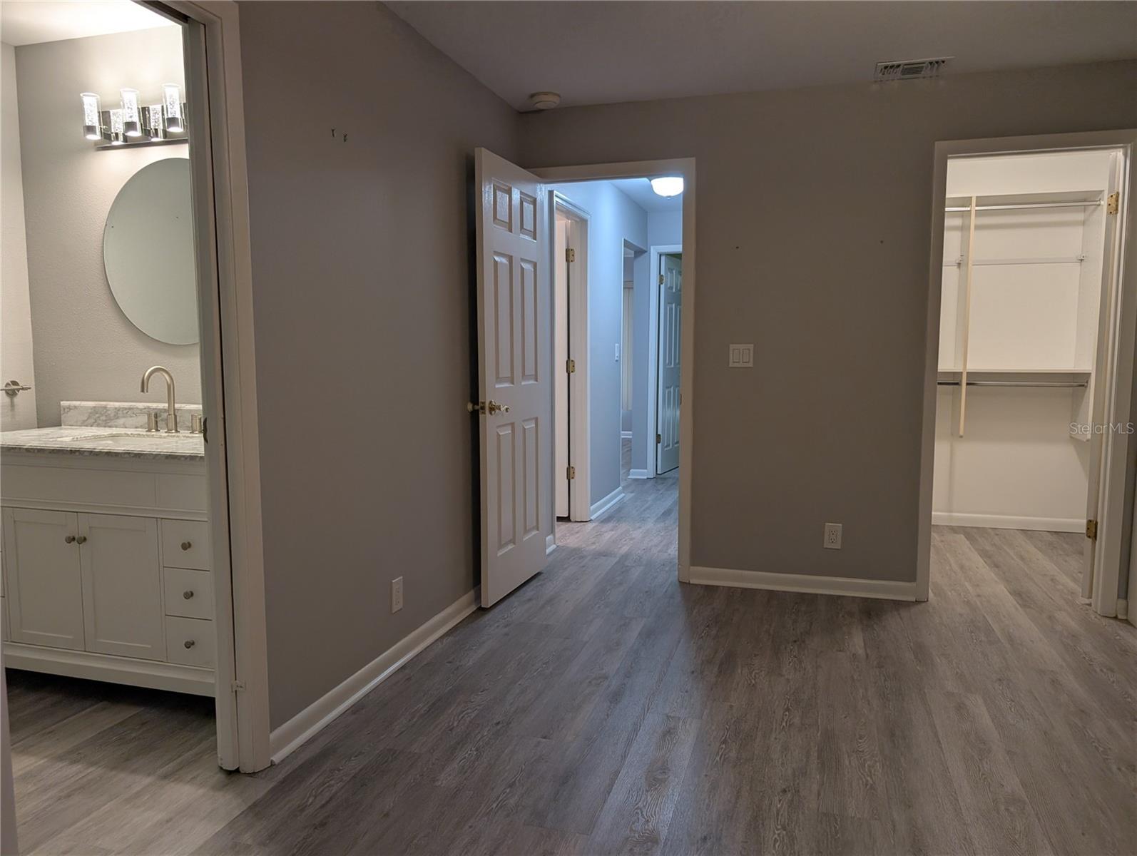 Open floor plan view of primary ensuite.  New fan was installed 2026.