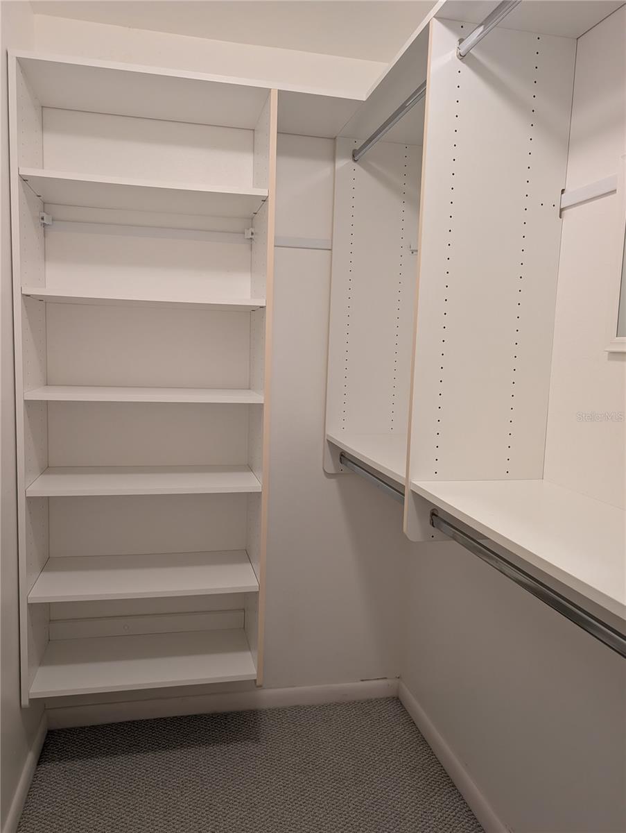 Walk-in, like the Master closet, is also designed like a California style closet.