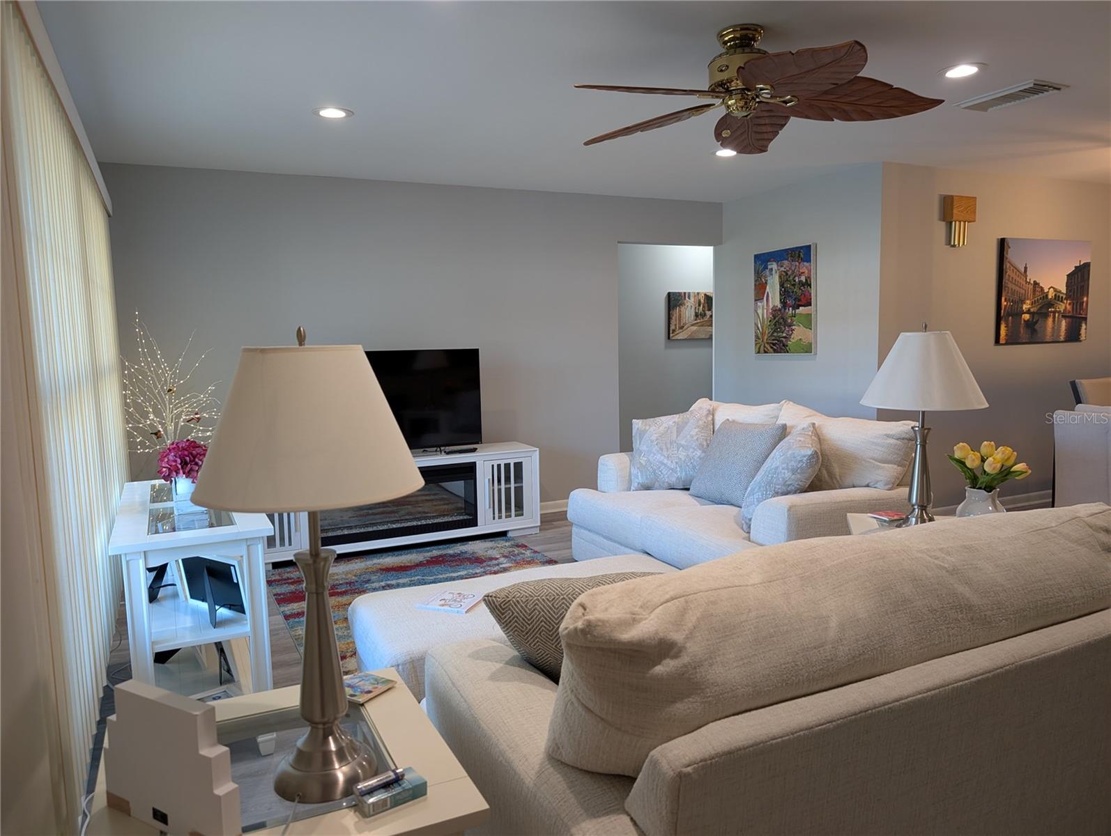 Another view of Living room from front entry to hallway.