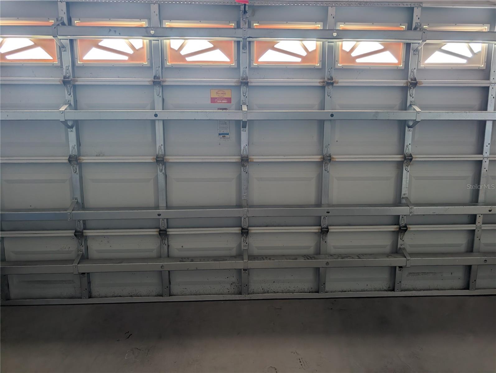 Clopay garage door safety features include reinforcing bars and locking mechanism. Updated by Precision in 2019.