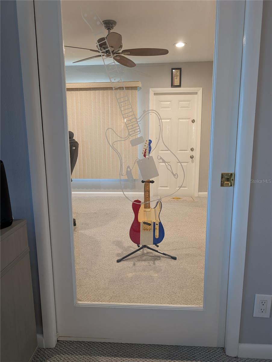 Bonus room previously used as music room and office.