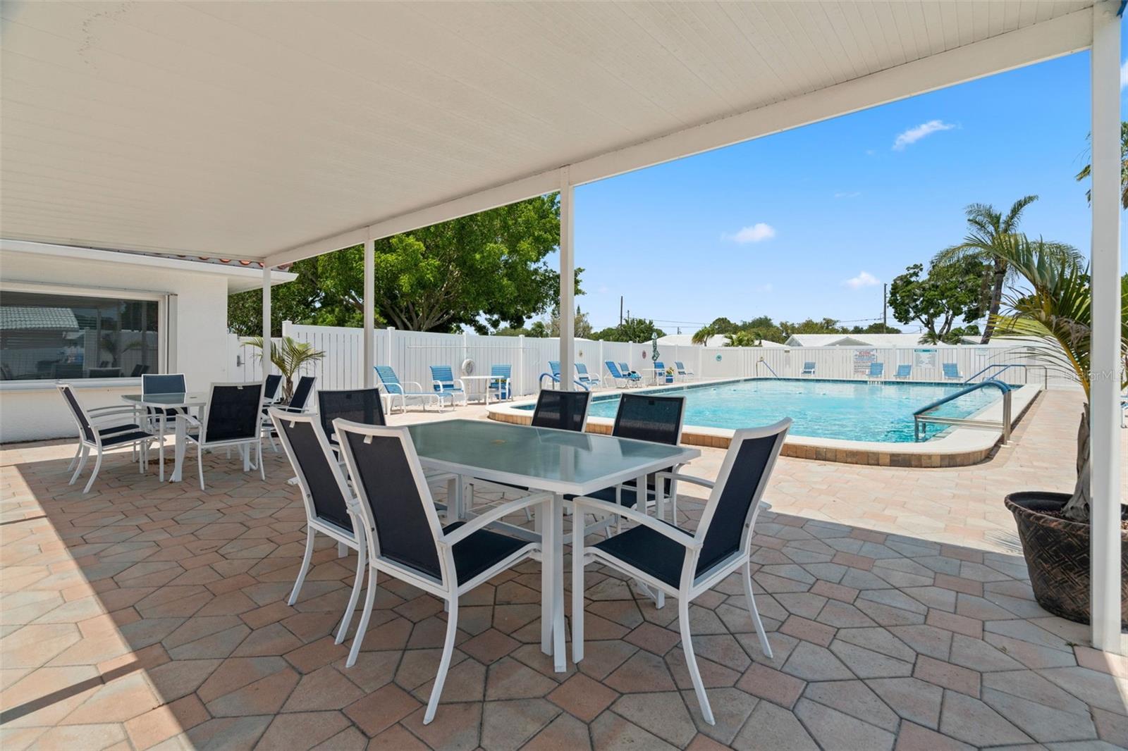 Pool area also provides covered protection to escape the sun when needed.