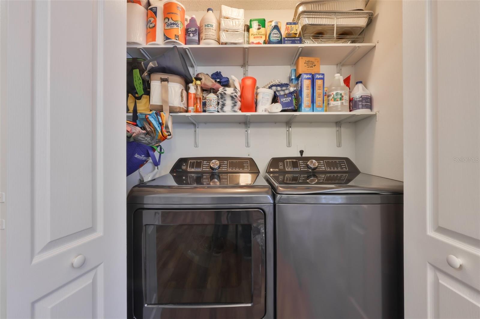 Washer/Dryer in closet near Kitchen