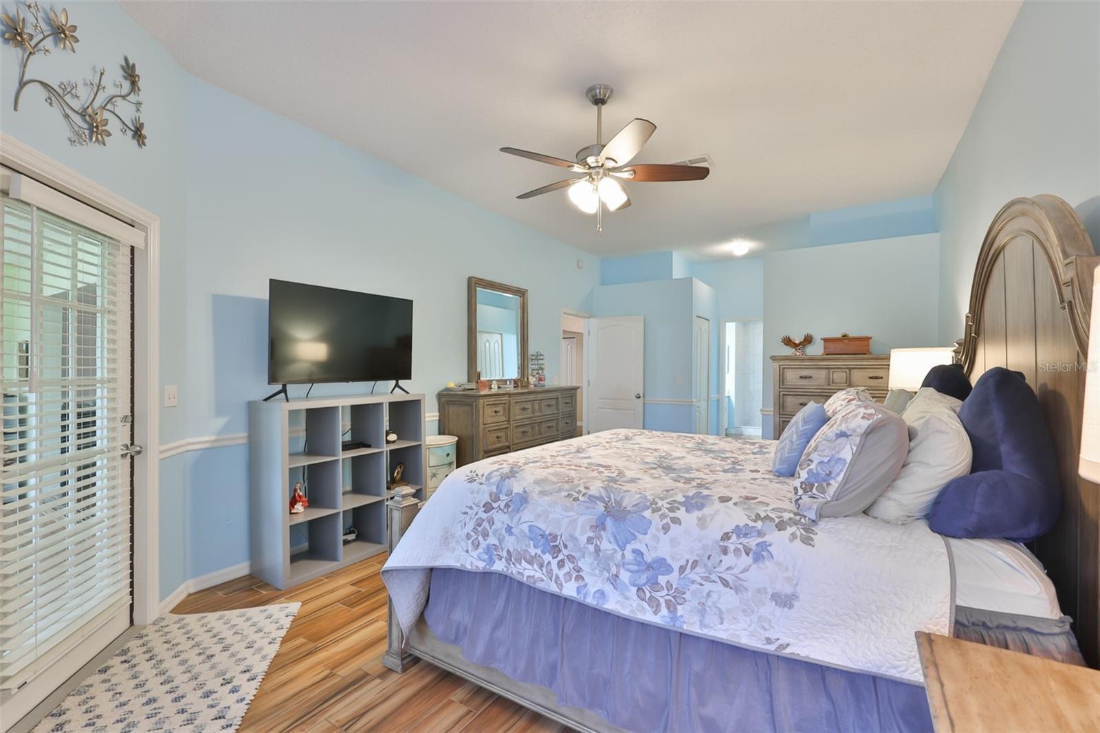 Primary Bedroom with door to the Florida Room
