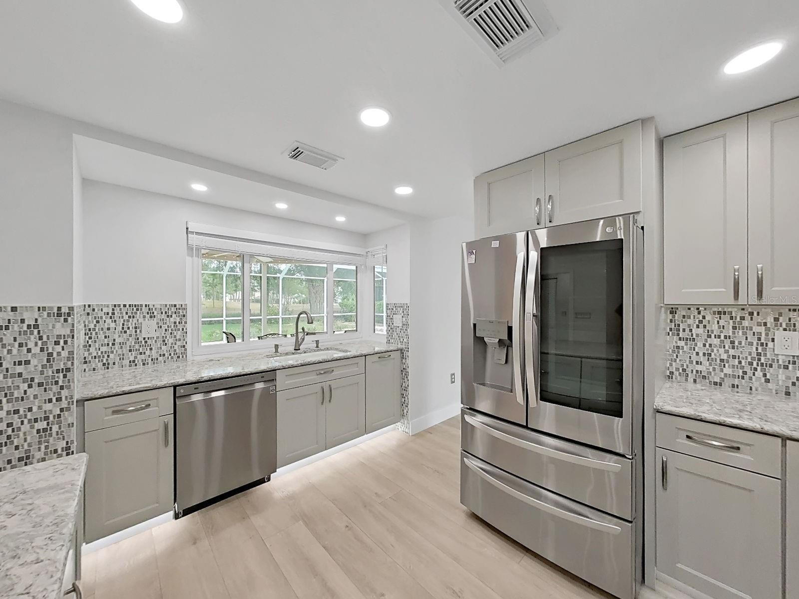 Lots of can lighting help make this home modern and clean looking.