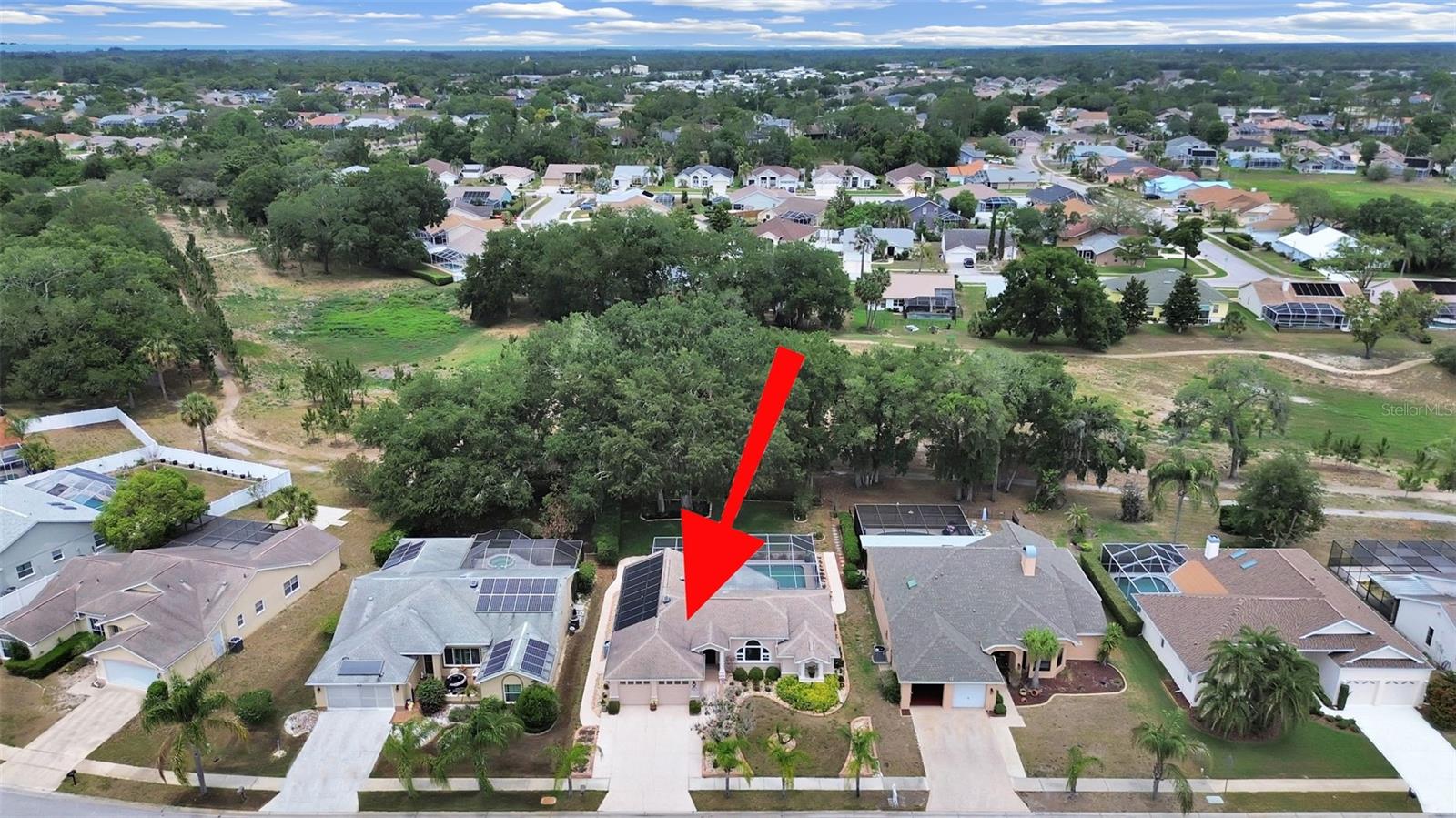 House backs up to a walking trail since the golf course is now deconstructed.