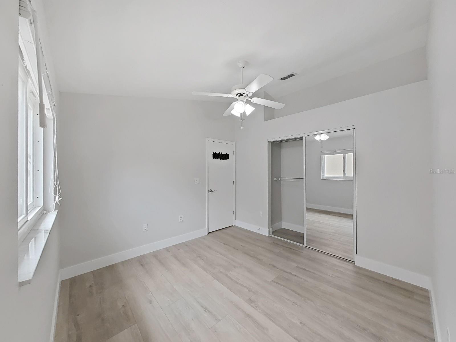 Bedroom #3, faux wood blinds throughout the house.