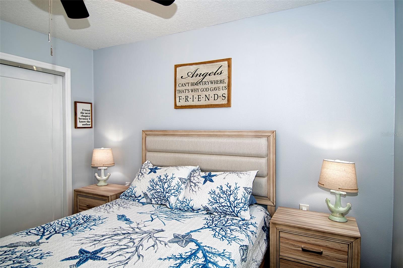 Master Bedroom retreat with tranquil coastal watercolors.