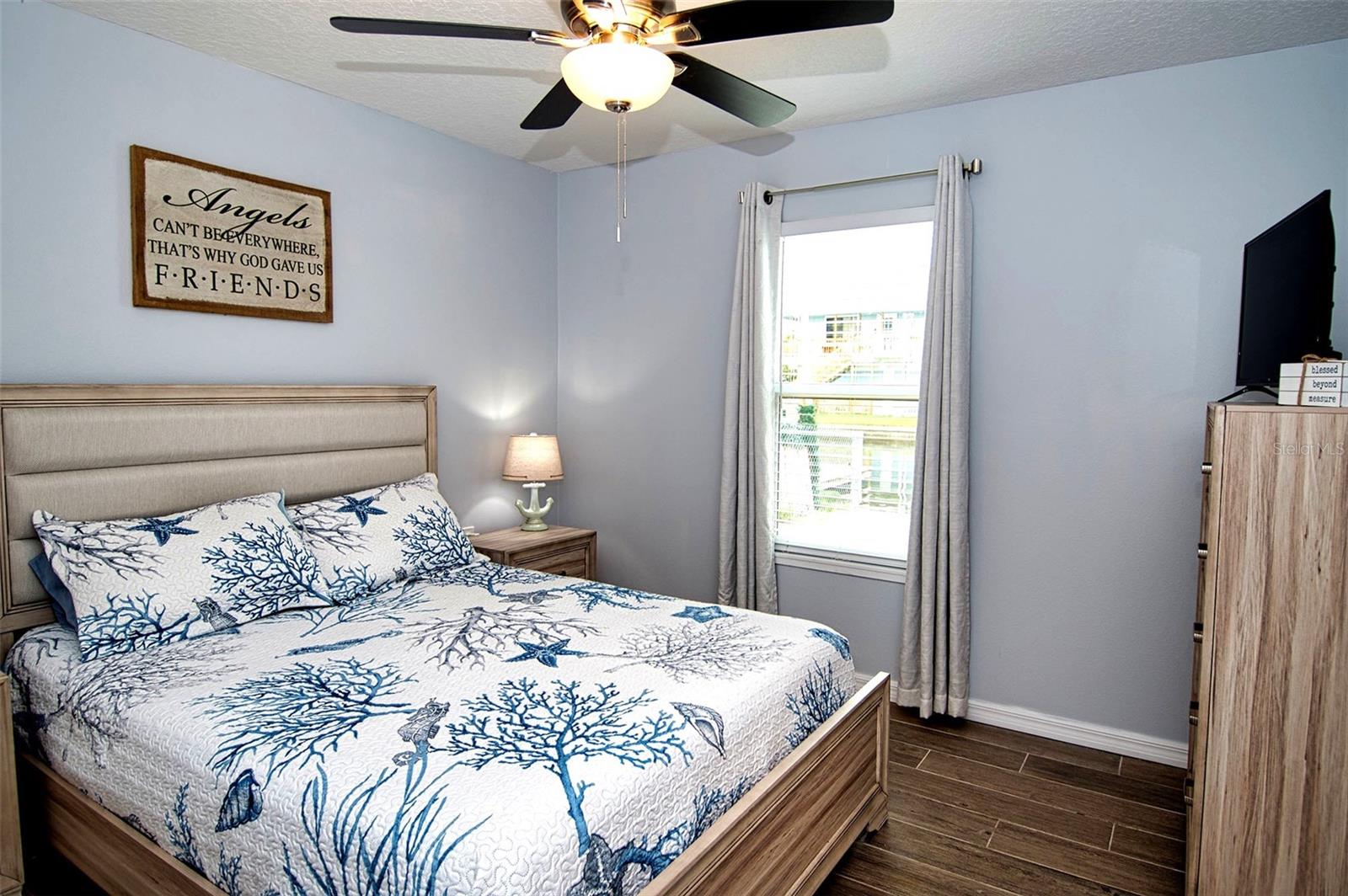 Large picture window brings in an abundance of natural light.