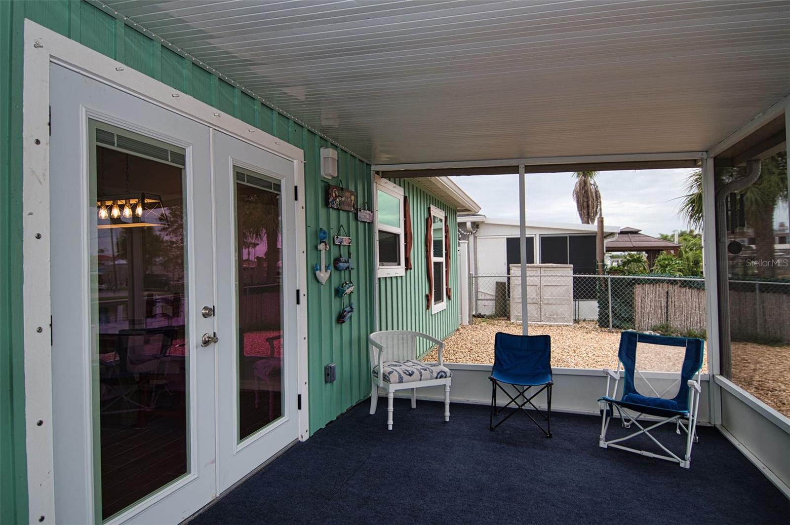 Another view of backyard porch.