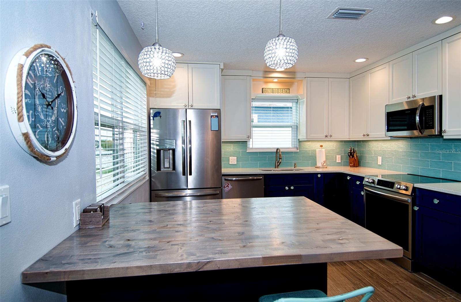 Food preparation in this amazing kitchen is a breeze with all its counter space and updated appliances.