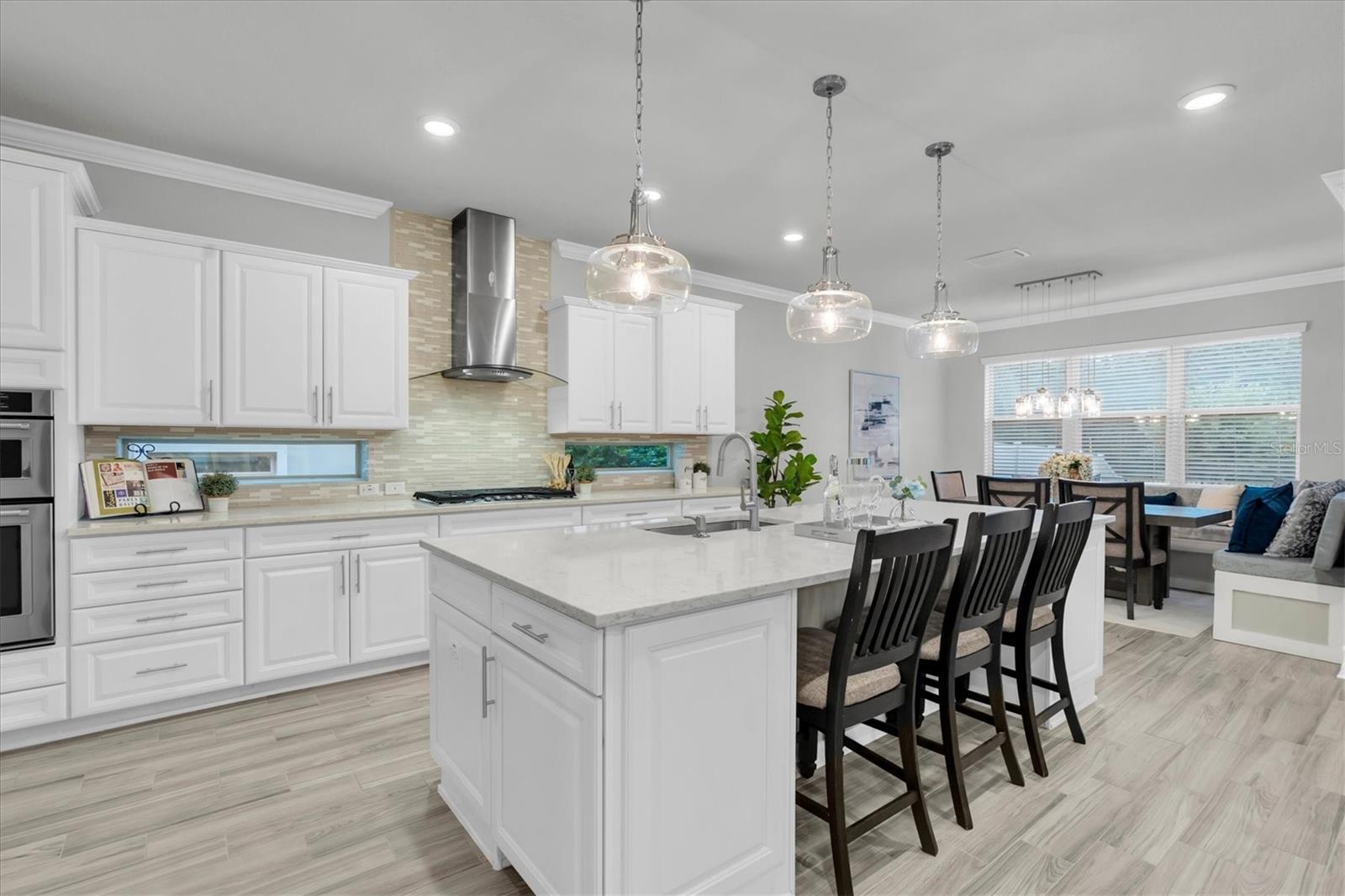 Kitchen w/ island & Cafe