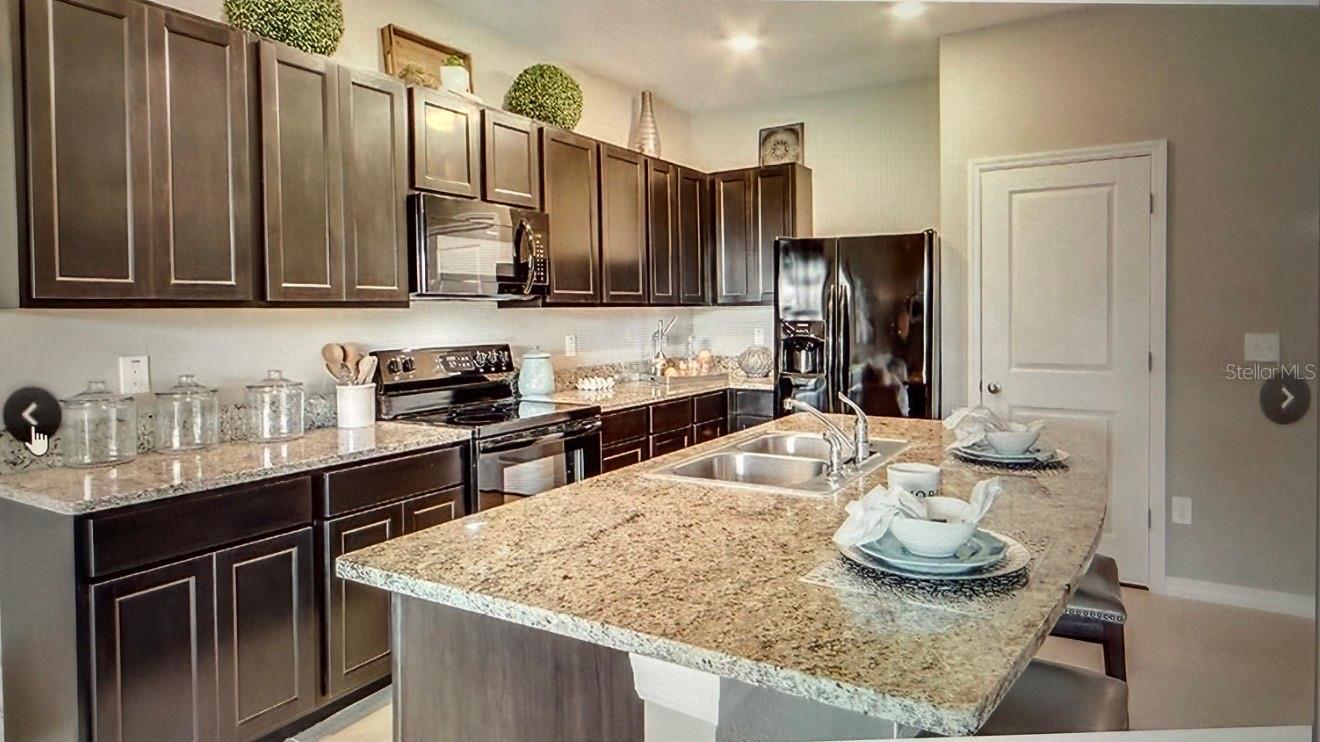 OWNER'S PICTURES OF KITCHEN