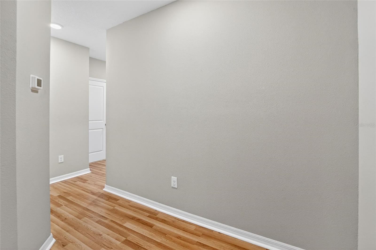 WOOD FLOORS IN HALLWAY