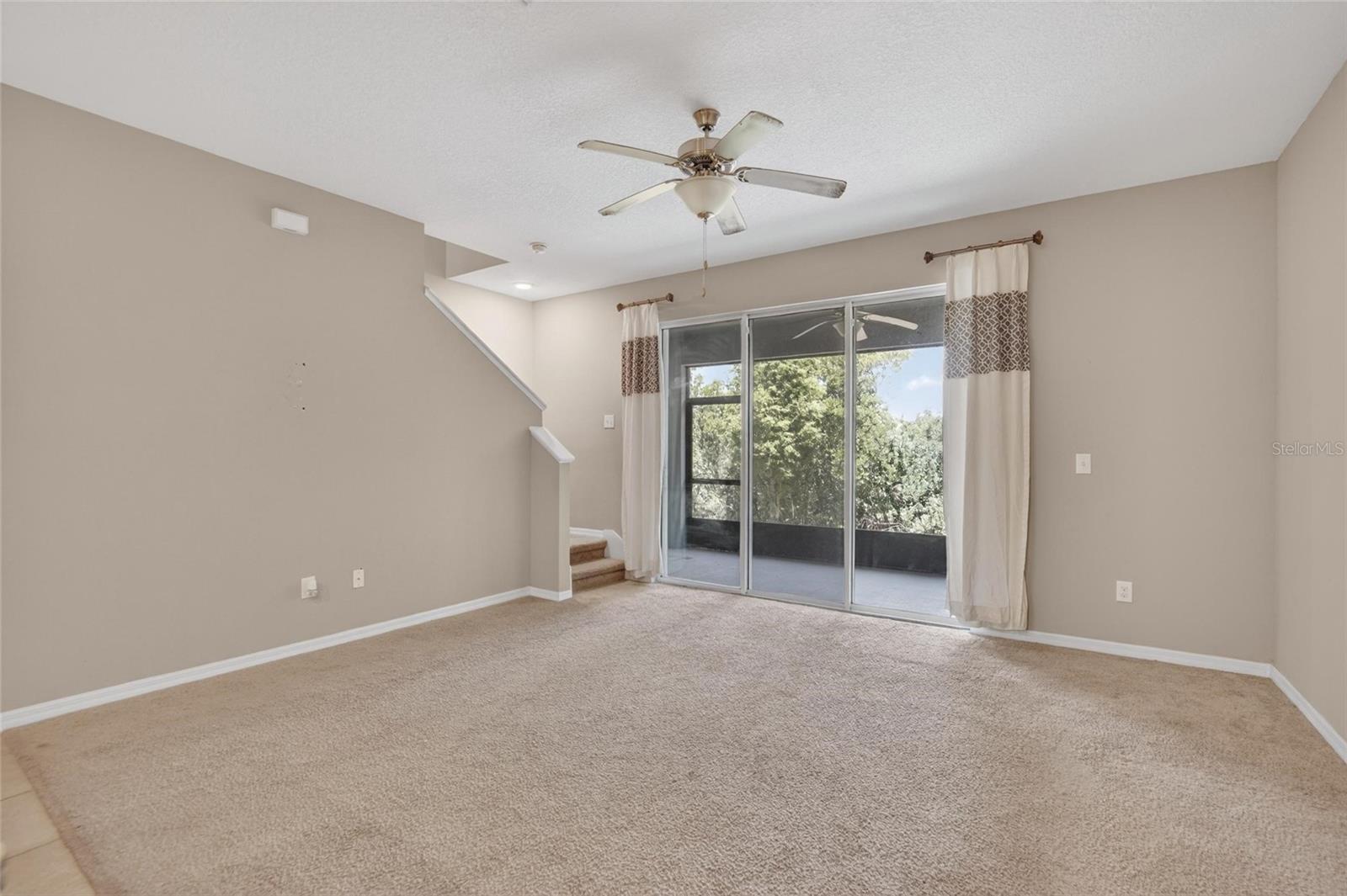 FAMILY ROOM LEADS TO THE COVERED LANIA