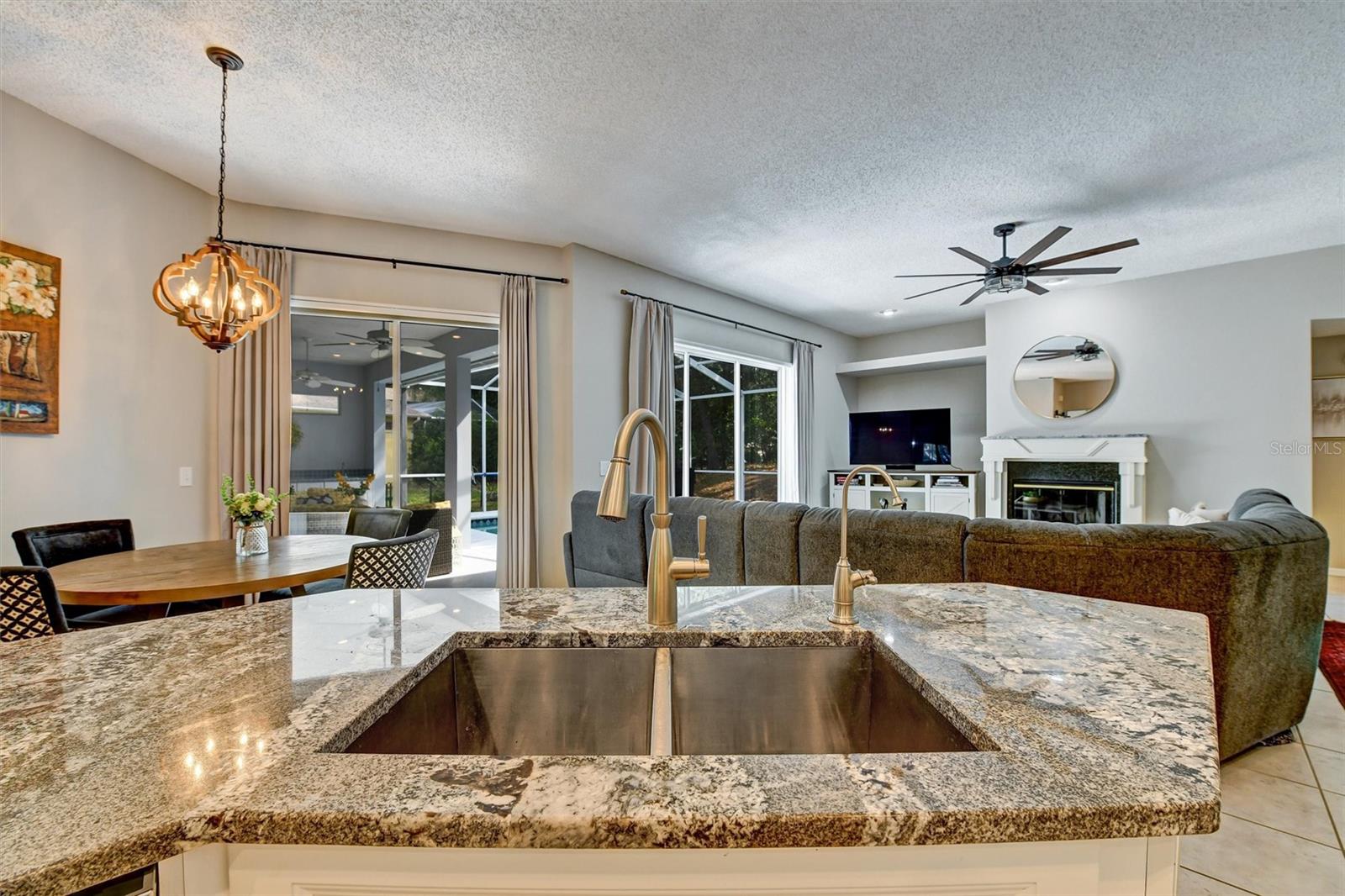 View of Family area and Pool from the kitchen
