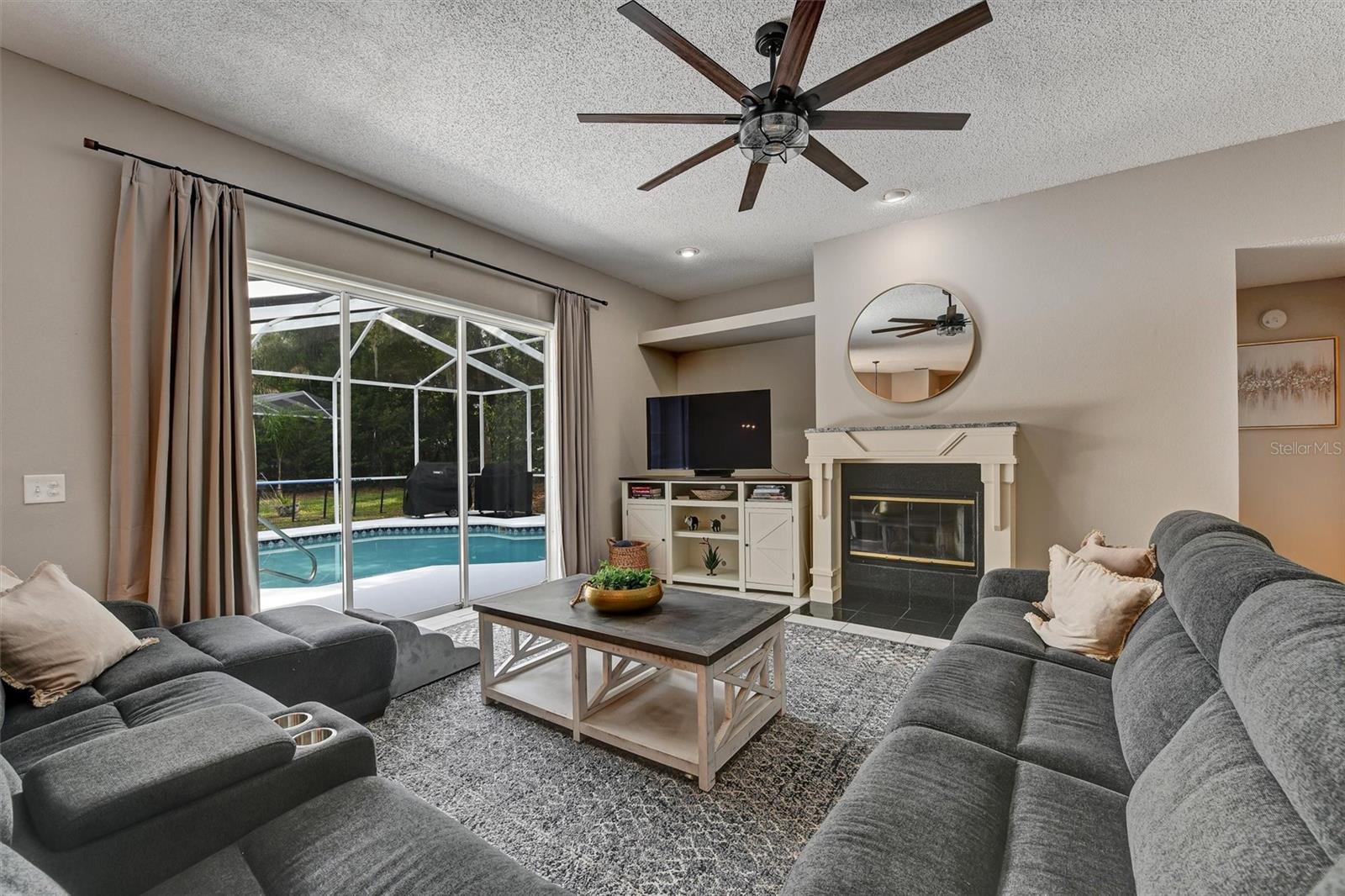 Family room with pocket slider access to the pool