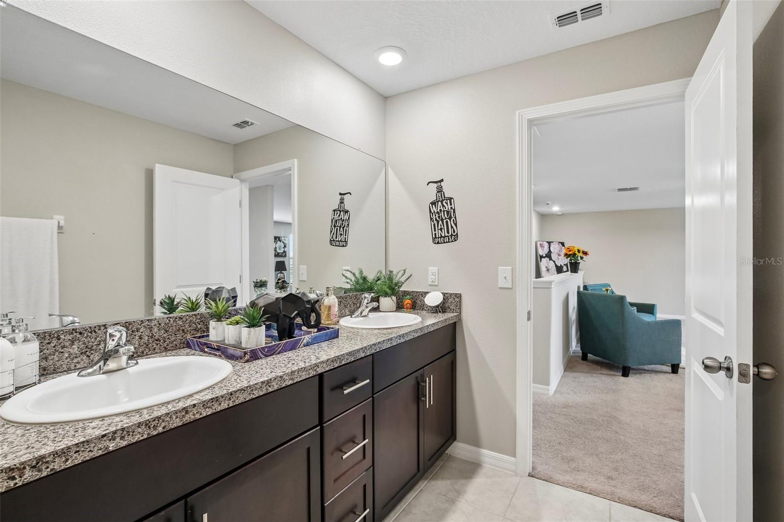 FULL BATH UPSTAIRS HAS DOUBLE SINK VANITY