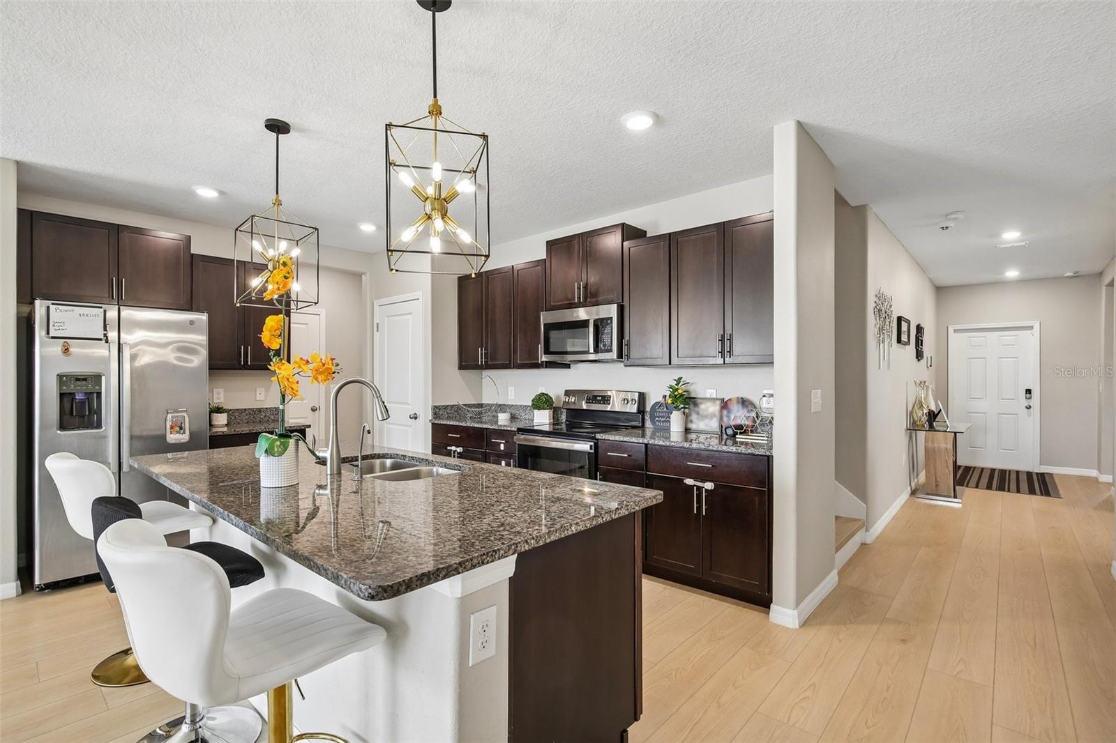 KITCHEN WITH GREAT COUNTER SPACE FOR EXTRA SEATING