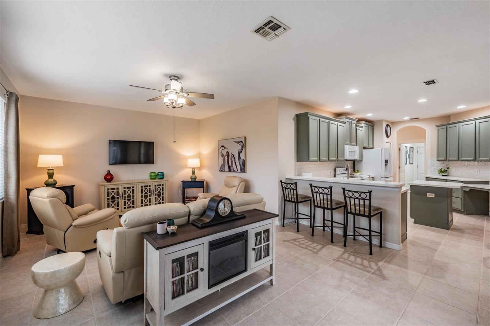 Adjoins kitchen