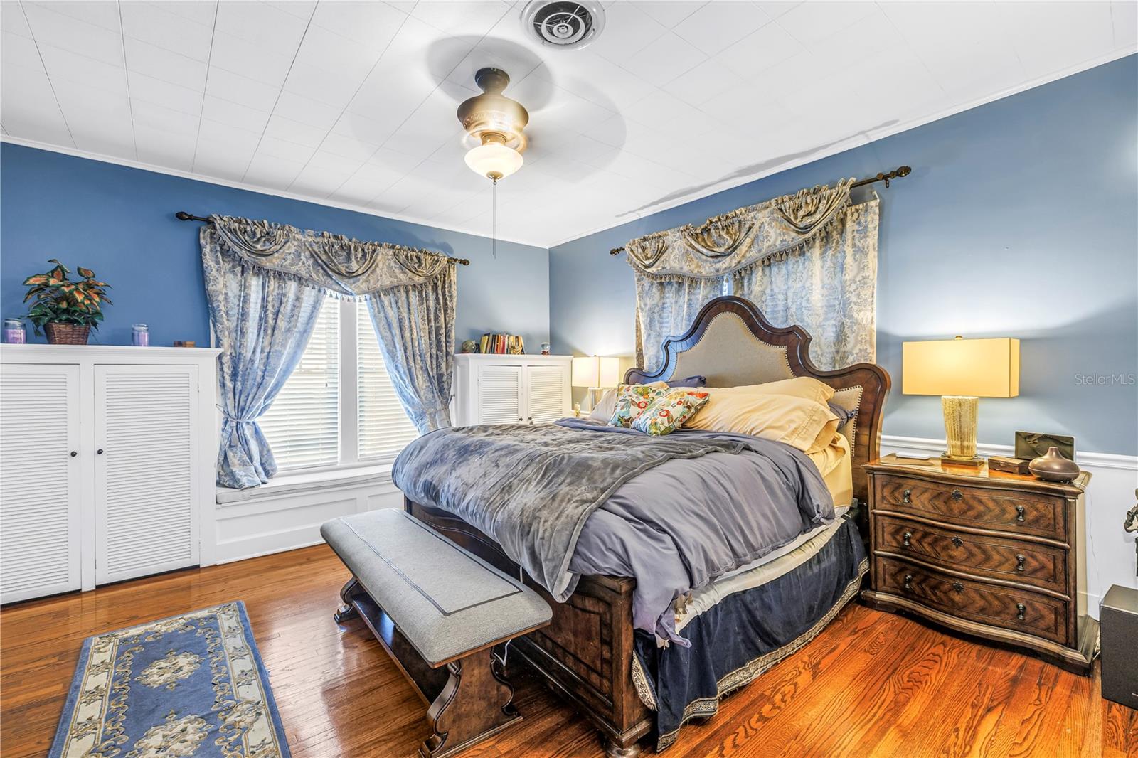 Large primary/master bedroom with built in closets and walk in closet