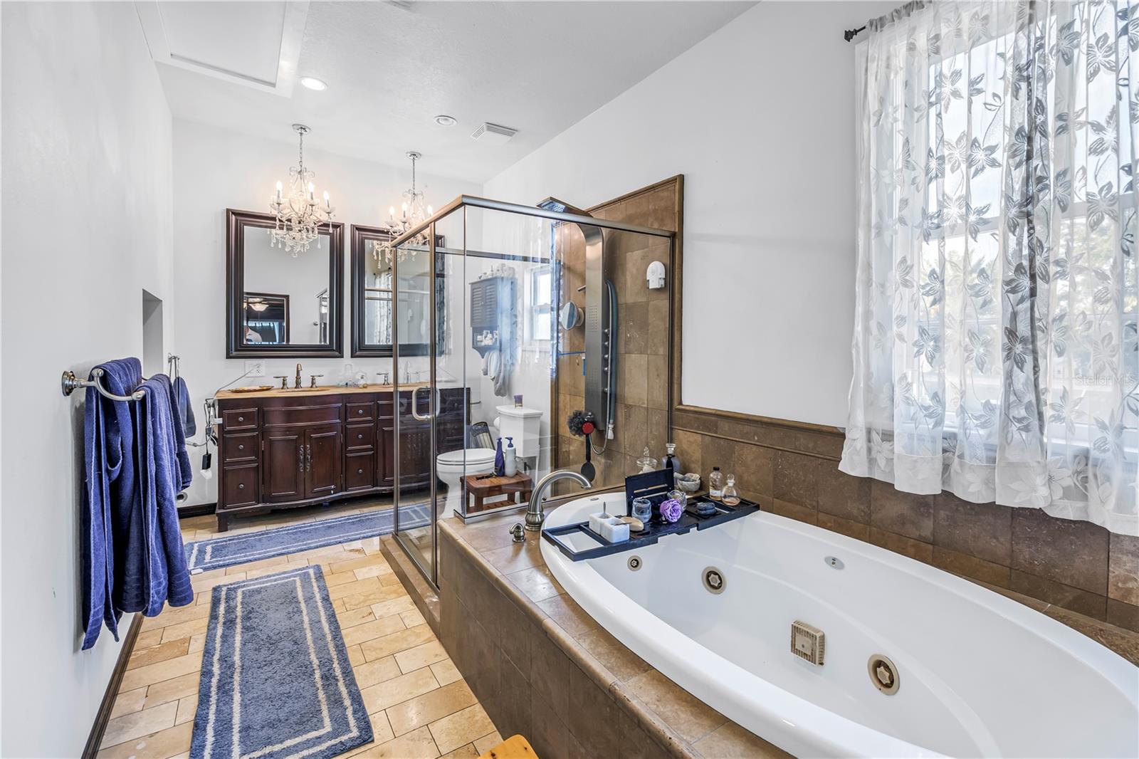 Updated master bathroom with soaking tub and dual vanity