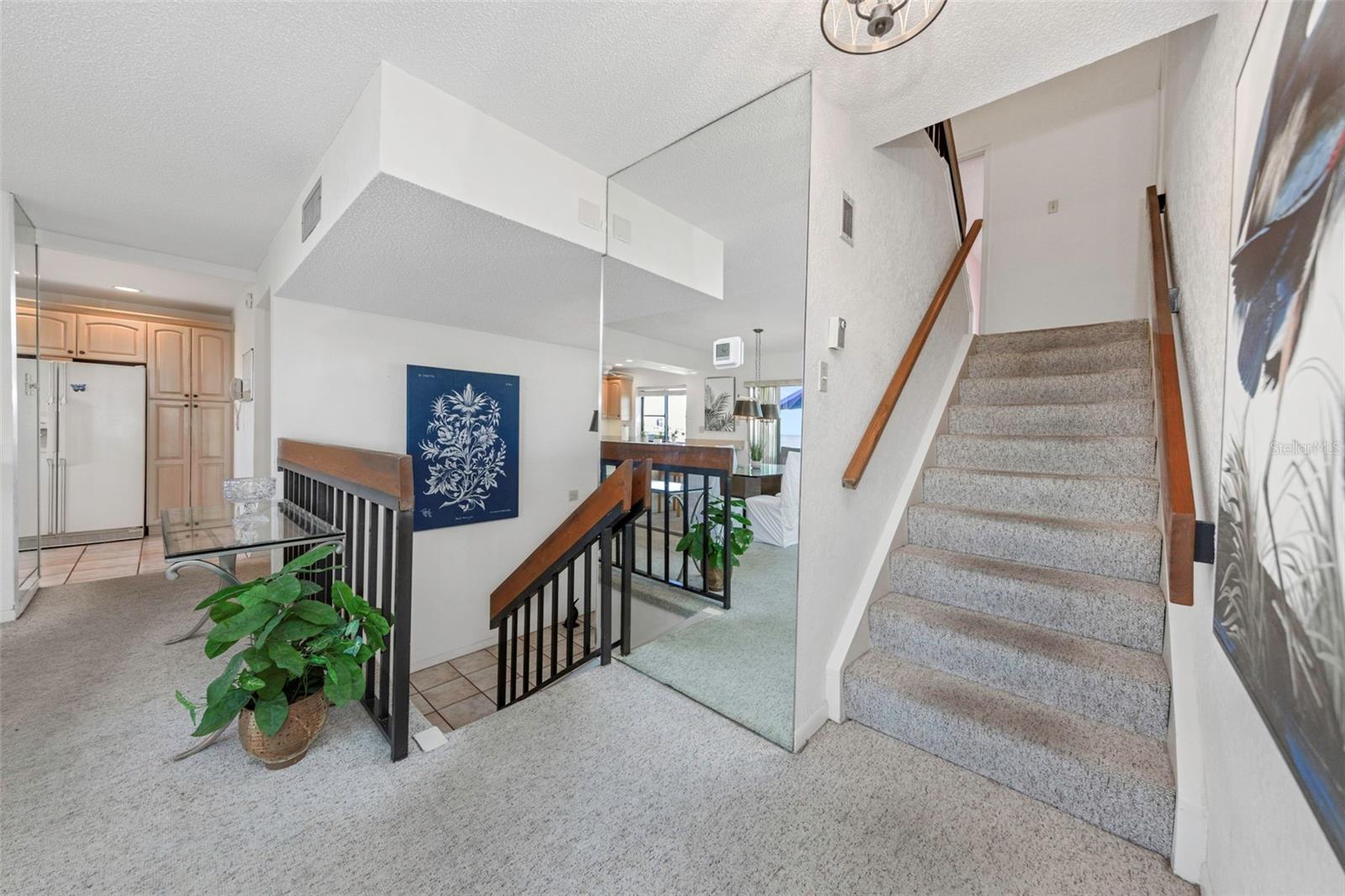 Stairs from main to mid levels