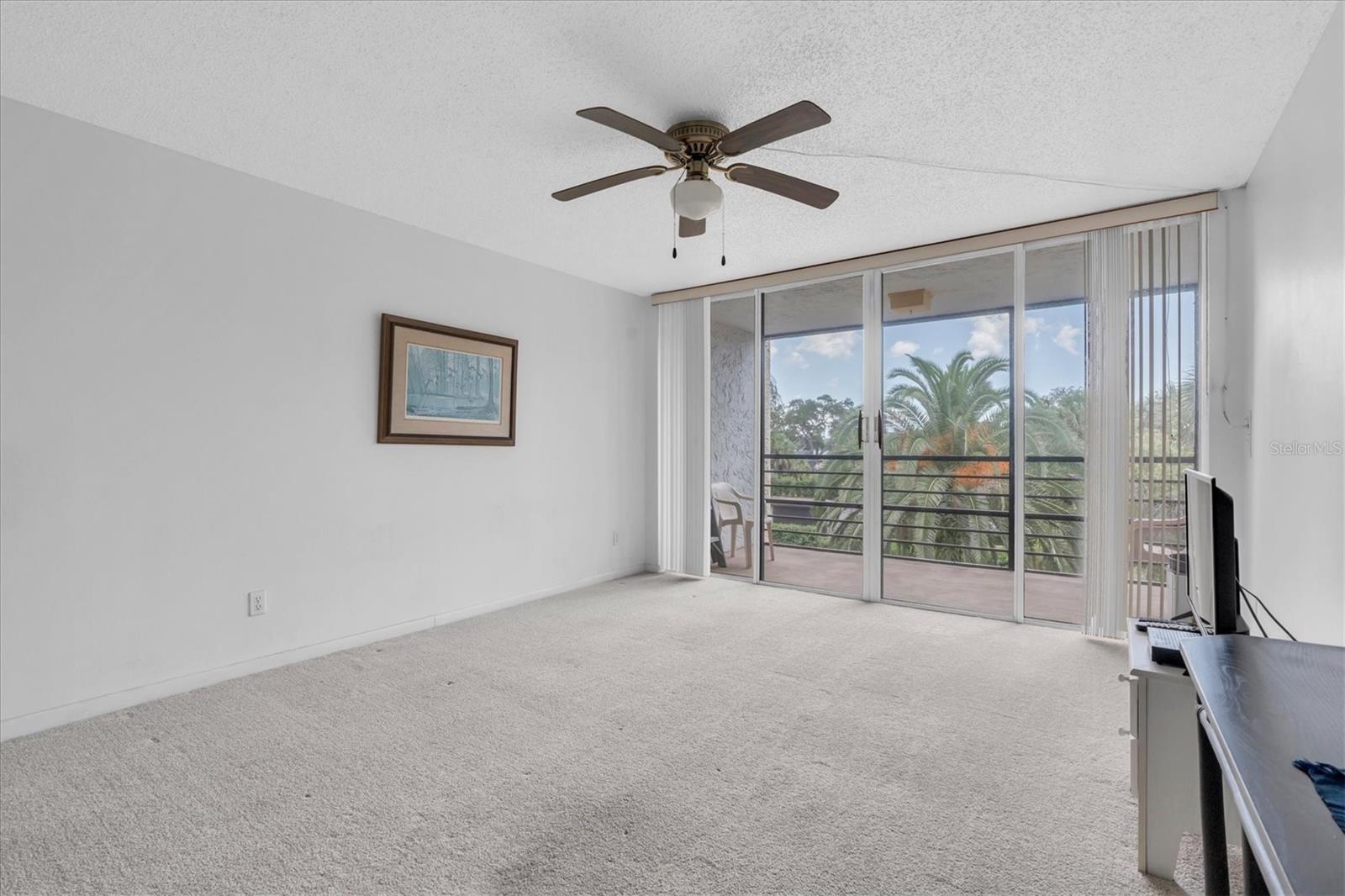Living room with patio access