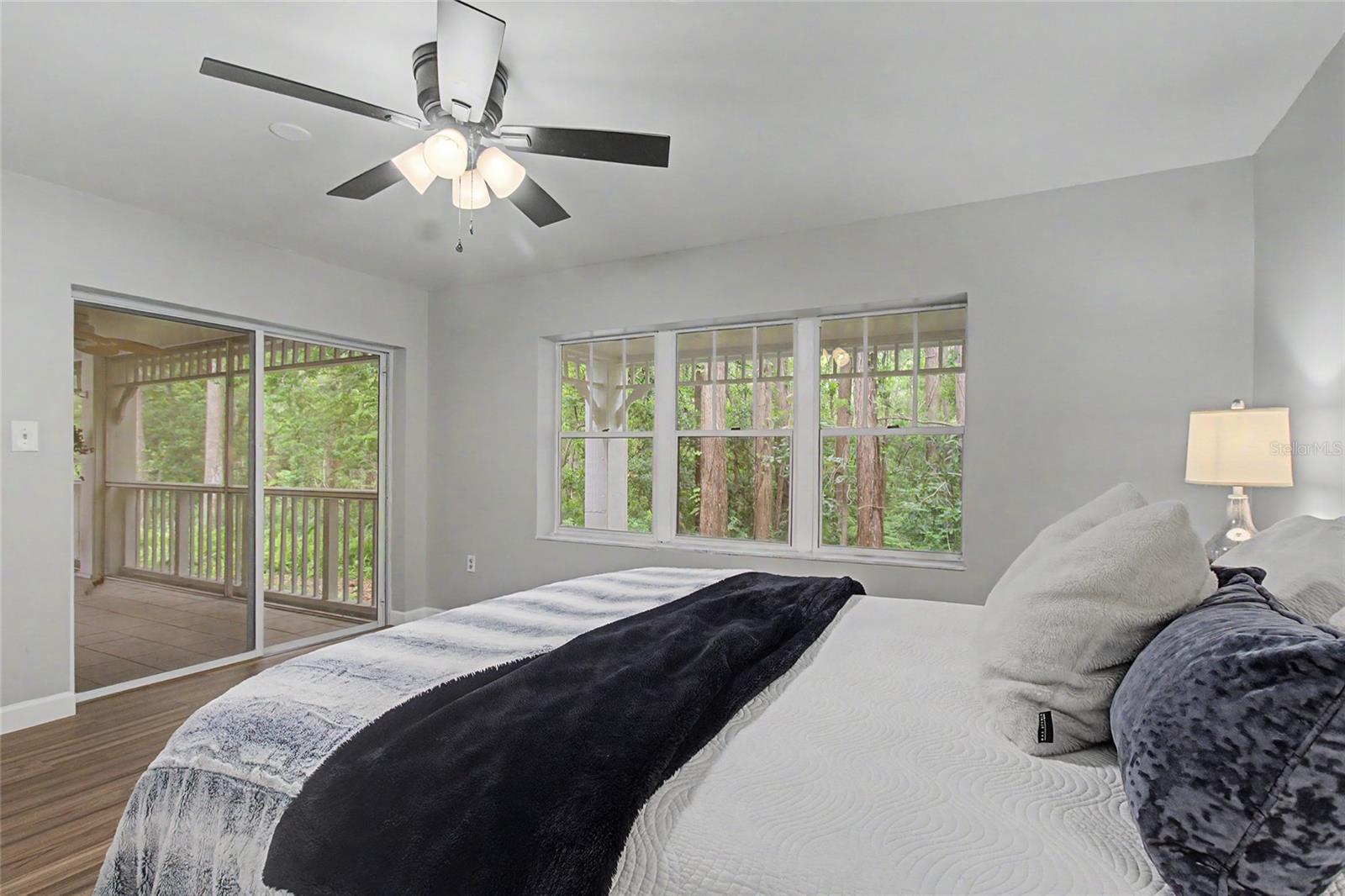 Primary Bedroom with  gorgeouus nature views and sliders to Lanai.