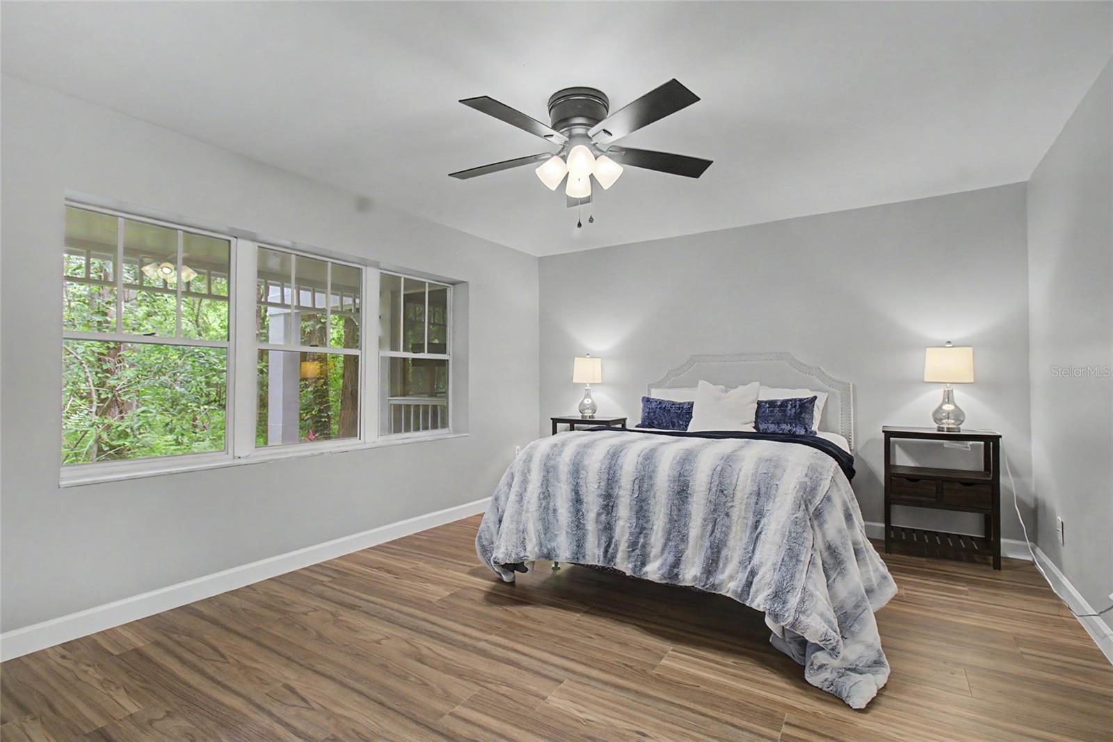 Primary Bedroom with  gorgeouus nature views and sliders to Lanai.