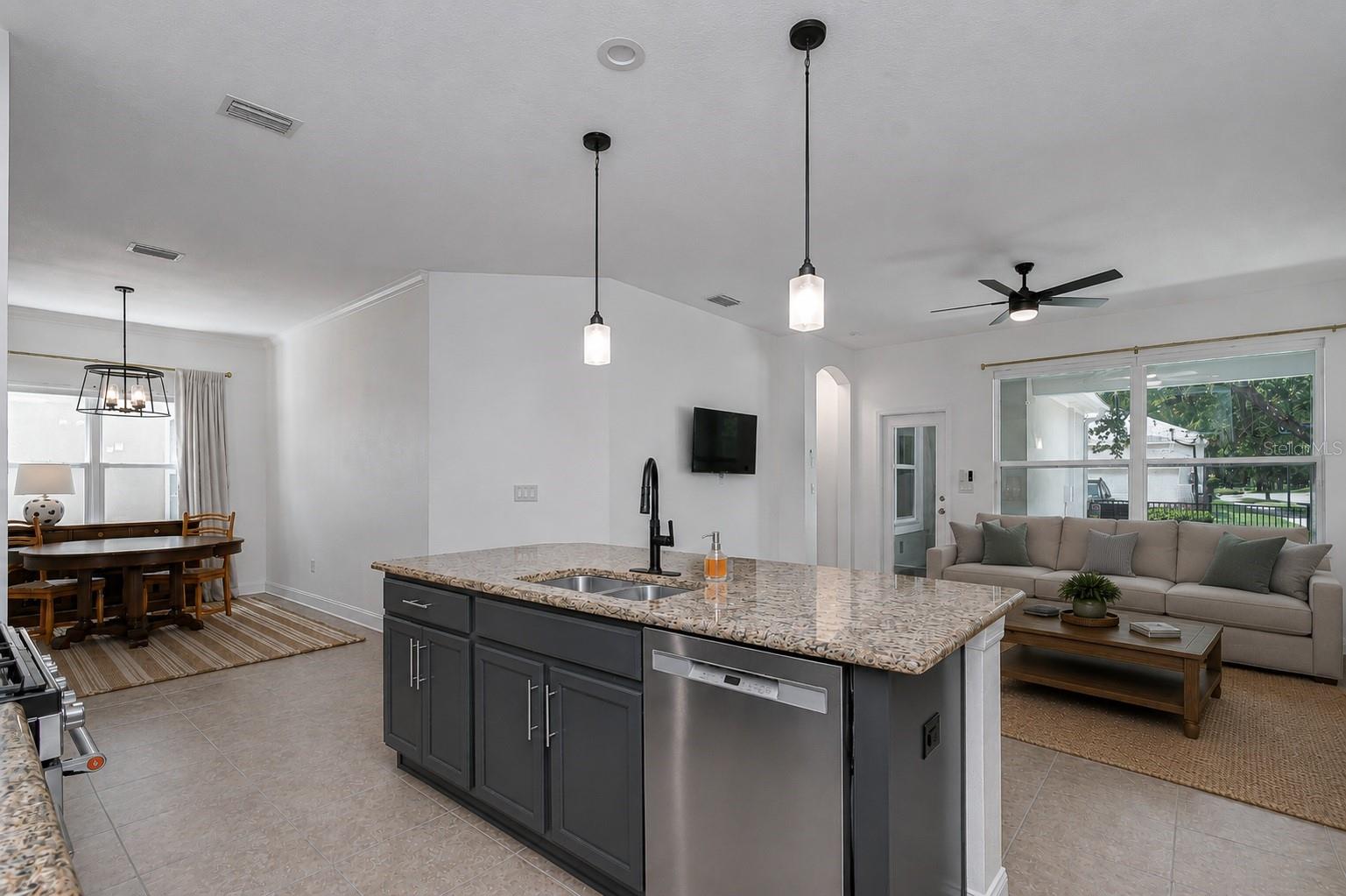 Seamlessly open to living & dining — ideal for hosting