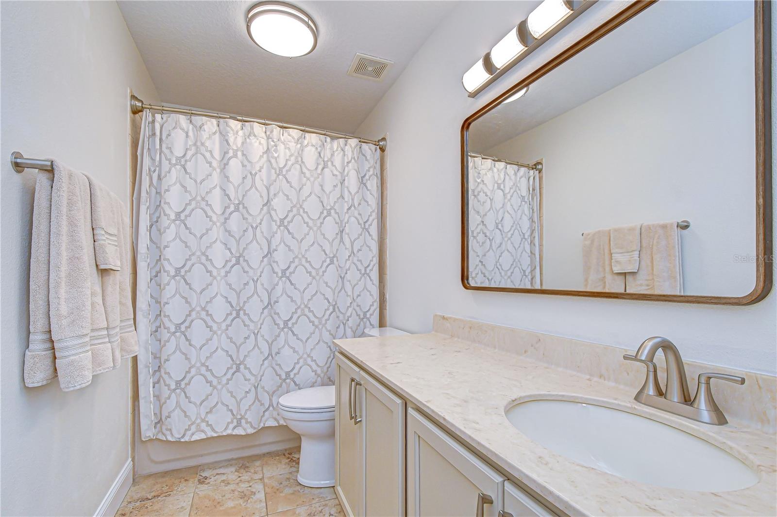 Full upstairs bath — well-appointed & updated